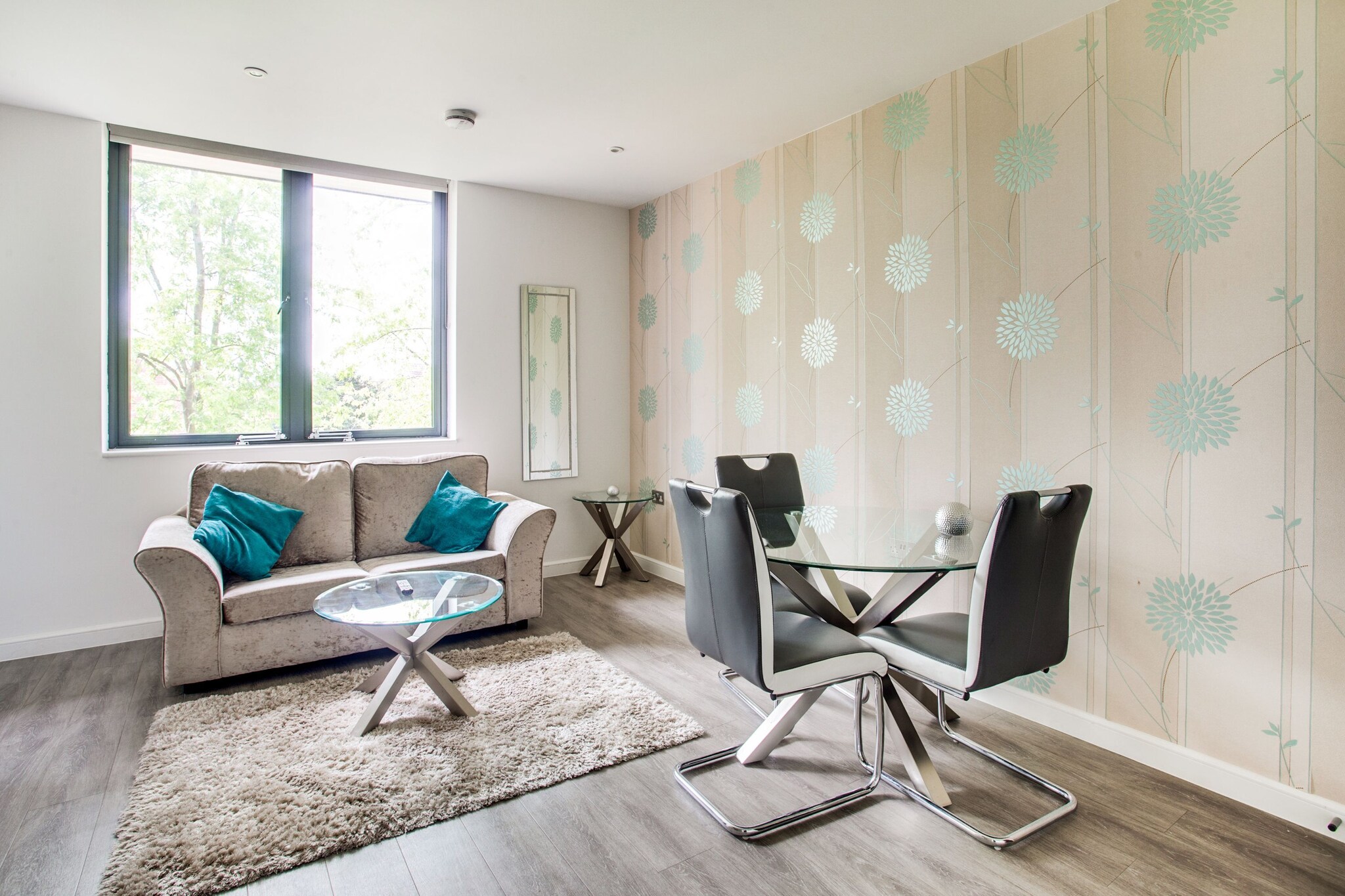 On the 1st floor: (Kitchen(stove, electric kettle, toaster, microwave, fridge), Living/diningroom(TV, dining table), bedroom(double bed), bathroom(shower, washbasin, toilet), heating)