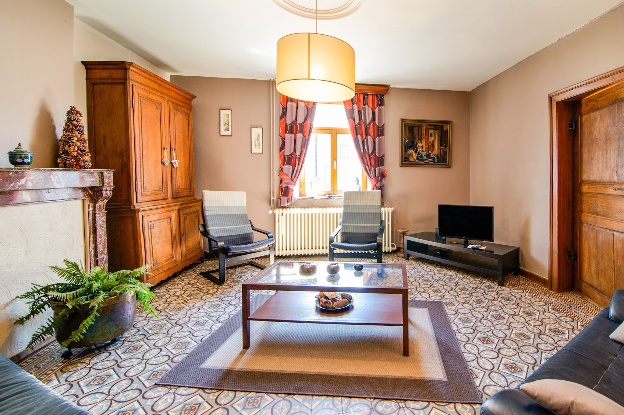 Located in a small authentic village full of charm, this 4-bedroom holiday home in Matagne-La-Petite offers a calm environment and is ideal for a large family or a group of 7 people. You have a private furnished garden to relax with a cuppa and a good read and a private terrace where you can linger and enjoy the surroundings. Washing and ironing facilities are also provided for your convenience. 

Lose yourself in the wilderness in a forest only 1 km away. General supplies and restaurants are only 5 km away. Grab a few drinks at the Brasserie des eaux vives brewpub only 3 km away. History lovers may rejoice as there is a museum at 4 km. A lake beach is 28 km away where you can indulge in both fishing and watersports. Virion Valley nearby is magnificent as well.

Enjoy barbecues in the evening or prepare delicacies with the help of an oven, microwave and an electric cooker (stove).

Charleroi Airport is 55km away.