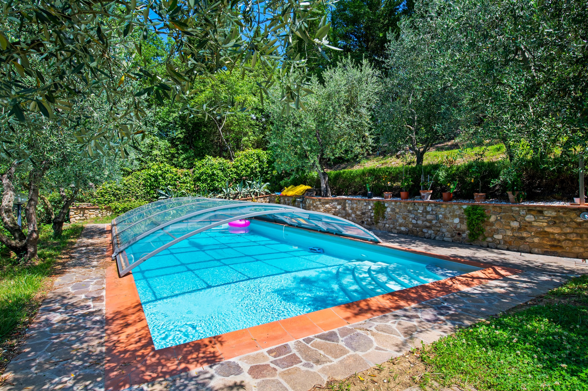 This Holiday home is located in a beautiful panoramic position in San Casciano Val di Pesa (FI) surrounded by amazing views of the countryside. There is 1 bedroom where 5 people can comfortably stay. Ideal for a small family on a vacation, the home features a shared swimming pool and a private garden for relaxing. 

The proximity to the beautiful city of Florence allows you to comfortably reach the capital of Tuscany and let yourself be fascinated by its unique attractions, famous all over the world. You can relish the local delicacies and drinks from the restaurants 500 m away. Buy the daily essentials from the general supply store 2 km away. Here, you will also find a bakery shop.

The house has been completely renovated with taste and in a comfortable way. Enjoy in the private outdoor space provided chit-chatting or having your morning coffee. Prepare tasty meals in the well-equipped kitchen. 

Florence Airport is 36 km away. 

