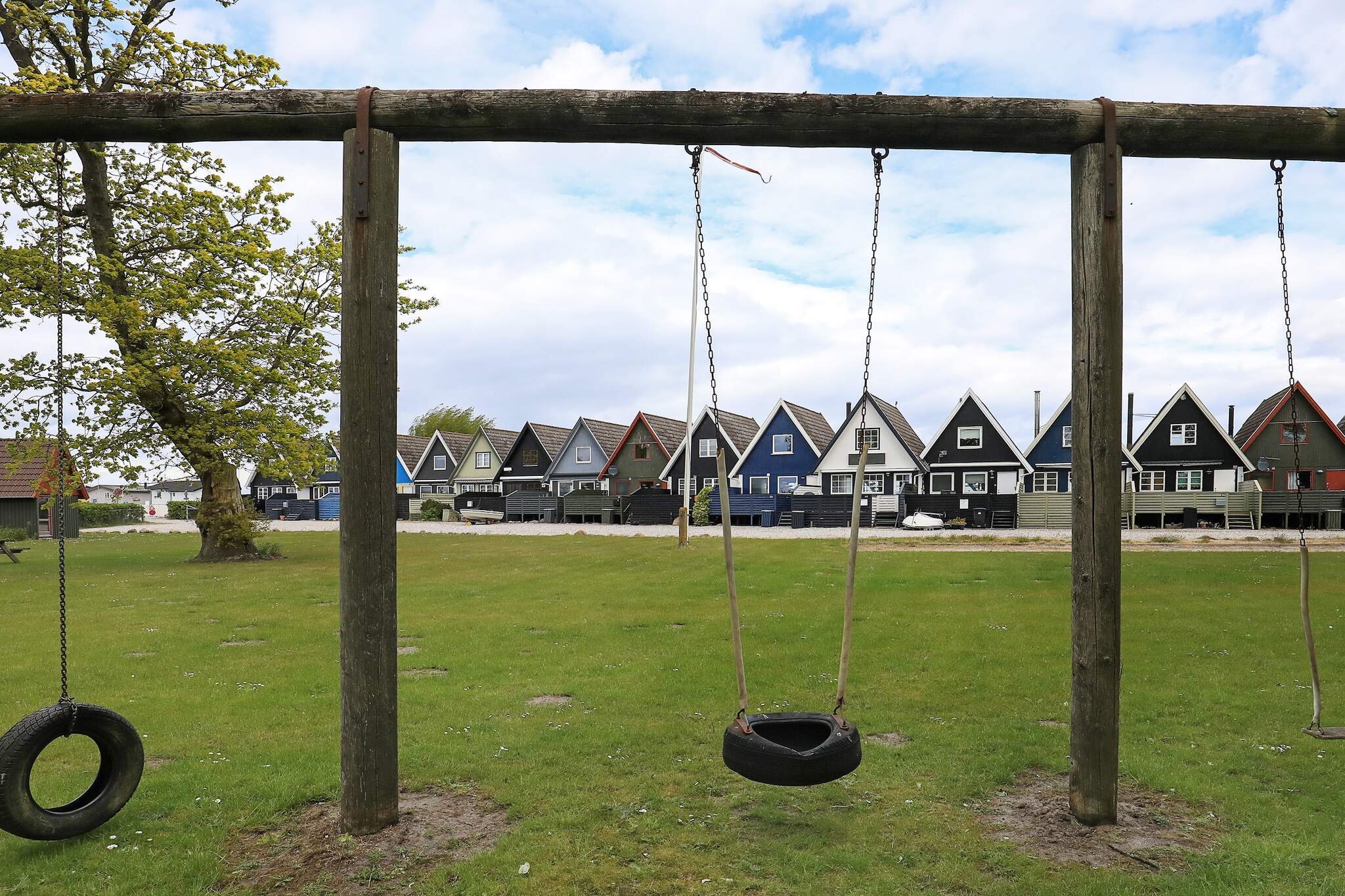 Internet Access DSL, open kitchen(cooker(electric), hood, coffee machine, microwave, dishwasher, fridge(+ freezer)), Living/bed room(TV(danish TV channels (DR1 and TV2)), DVD player, radio, high chair), bedroom(double bed, cot), bedroom(double bed), bathroom(floor heating)(bathtub or shower, washbasin, toilet, washing machine), heating(electric), terrace, garden, BBQ, air to air heatpump