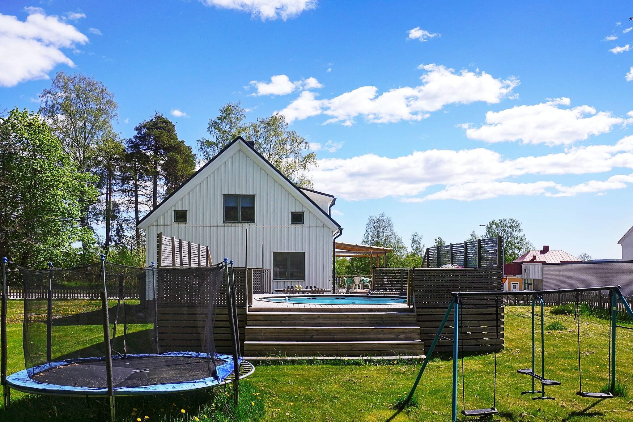 Welcome to an older large and charming house with its own pool in the middle of beautiful Dalsland with a view of Laxsjön. The house is centrally located with close proximity to everything you could need for a wonderful holiday. Here you can enjoy the sun on the large terrace, a dip in the pool or take a trip out into the beautiful forests. This is an accommodation that is perfect for the larger family or company. Here is lovely surfaces that invite to play, swimming and relaxation. You are welcomed directly via a smaller hall. You enter directly into the kitchen with dining area for 4-6 people. There is also an entrance to the bathroom with toilet and shower. To the left you enter a bright room with dining table for 6-8 people and an arch into the living room with comfortable sofa and TV. Outside the window you can see the pool and the lovely garden. From the hall there is a staircase up to the upper floor where there are two large bedrooms. The first has a double bed and a 90cm bed overlooking the lake. The other has a double bed 180 cm wide and with a single bed 90 cm. Adjacent to this bedroom is a sleeping alcove with another double bed. Here you have a view of the pool and the garden. The house has a large inviting terrace with lovely outdoor furniture and with barbecue. Here you can sit and enjoy a good dinner in the evening. The whole house is bright and charming with mixed furniture. In this house there is everything you could need for an unforgettable holiday in Dalsland. If you book with cleaning, the cleaning company cleans the pool of leaves. Otherwise you as a guest must do this on arrival and before departure. Take a visit to one of the beautiful bathing spots around, check out Dalsland's canals, do a Moose safari and experience the magnificent beautiful nature. Welcome to enjoy magnificent nature in a wonderful charming villa with pool.