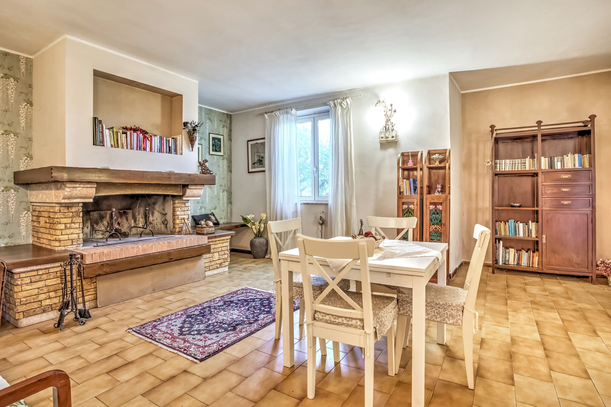 Ground floor: (Large kitchen(hob, oven, dishwasher, fridge, washbasin), Living/diningroom(double sofa bed, dining table, fireplace), bedroom(bunk bed), bedroom(bunk bed or 2 single beds), bathroom(shower, washbasin, toilet, bidet, washing machine))\n\npatio, garden, garden furniture