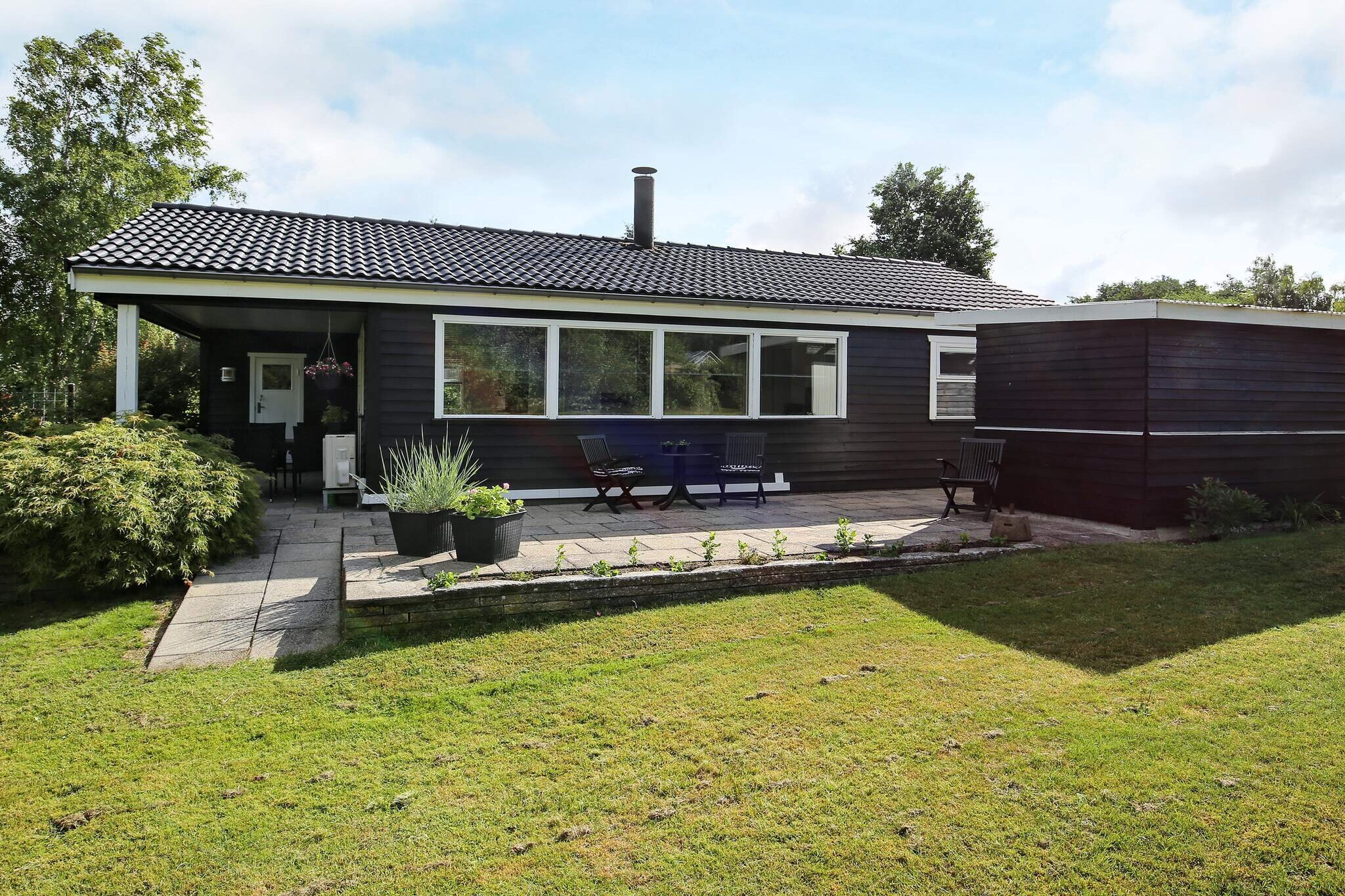 Well maintained cottage only approx. 200 meters from the sea at Dalby Huse. Open kitchen / living room and nice bright living room with direct access to large, covered terrace. Nice bathroom. There is a double bedroom and a room with a sofa bed. The house has a locked annex with a large, covered terrace where table tennis and darts can be played. Here the grill can be lit, the wine can be pulled up, and you can enjoy the glorious silence. There is also a campfire site on the large, well-landscaped grounds. Not for rent to youth groups.
A refundable deposit might be charged closer to your check-in date. This deposit covers utilities consumed during your stay and any additional services that may be taken. The final amount will be adjusted based on actual meter readings, actual usage of extra services, and any remaining balance will be refunded within 21 days after checkout.