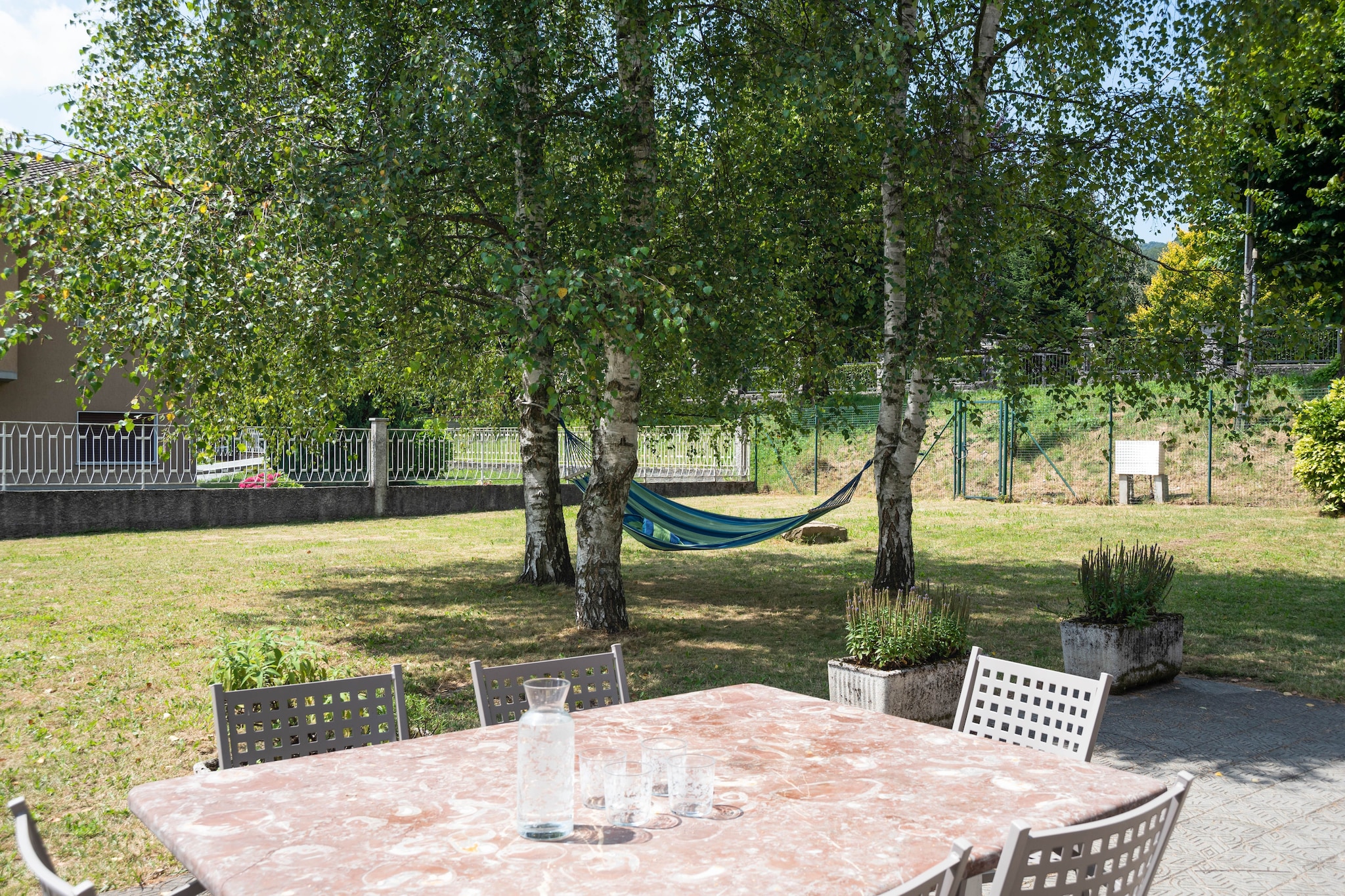 An optional utilities and service fee of EUR 300,00 will be charged before your arrival. Details are given below.<br> Spend convivial moments and enrich your vacation in this appealing villa in Lanzo d'Intelvi with 3 bedrooms and 1 living/bedroom in the attic which can sleep a large family or a group of 9. The home is from the early 19th century and is based in the mountains above Lake Como, and features a large garden where you can relax on a hammock and an outdoor patio where you can enjoy barbecues. The town centre is 1 km away, where you can find both restaurants and supermarkets. Enjoy horseback riding only 5 km away and climb Mount Sighignola from where you can climb up to the scenic spot of Balcone d'Italia and enjoy a breathtaking view of Lake Lugano. The nearby area is ideal for lovers of lake, trekking and skiing. Grotte di Rescia is 14 km away where you will find nicely-decorated caves and waterfalls and you can try camping here as well. Argegno is 15 km away while Lugano town centre is 20 km away. There is also a library and piano in the home. Malpensa Airport is 80 km away. <br><b> Optional Utilities & Service Package </b><br><b> An optional utilities and service package of EUR 300,00 </b> can be selected prior to your arrival. You will receive a separate communication with the payment link should you wish to include it.<br>This package ensures a seamless stay and conveniently covers services such as final cleaning, utility consumption, service support, and protection against minor damages or incidental costs during your stay.<br>Guests who prefer may manage these services independently, provided the property is returned in good order at check-out.