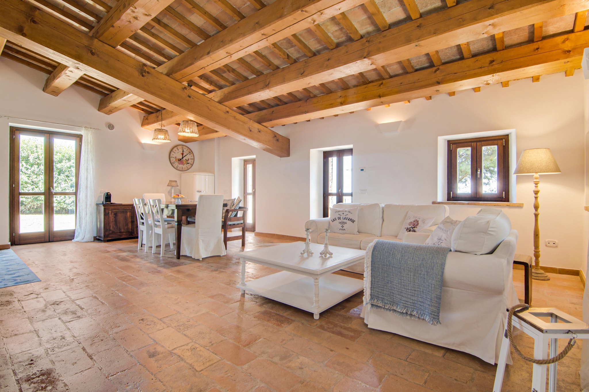 Set within a grand 16th-century noble villa, this charming apartment offers a peaceful retreat with a shared fenced lawn and sweeping views of the Adriatic Sea. Surrounded by manicured greenery, it invites you to relax under the sun on loungers, enjoy cozy evenings by the BBQ, or take a refreshing dip in the expansive shared swimming pool. The patio is perfect for a slow breakfast, while the interiors blend rustic charm with modern ease.
Just 500 meters from the heart of Villagrande, this serene location places you at the crossroads of nature and culture. The historic hilltop town of Mombaroccio, known for its medieval walls and panoramic vistas, is a gem waiting to be explored. A 30-minute drive brings you to the beaches of Fano, where you can unwind along the Adriatic coastline or explore Roman ruins and the picturesque old town. The surrounding countryside is perfect for scenic drives and tranquil hikes.
Indulge in authentic regional fare at the nearby Grani di Pepe, only 400 meters away, known for its seasonal dishes and warm ambiance. Freshly baked goods await just around the corner at the local bakery, perfect for morning treats. Venture a bit farther to Fano for seafront restaurants serving freshly caught seafood and local wines, rounding out your stay with the rich culinary heritage that Marche is loved for.
Note- The swimming pool is opened from 15th May till 30th September every year.