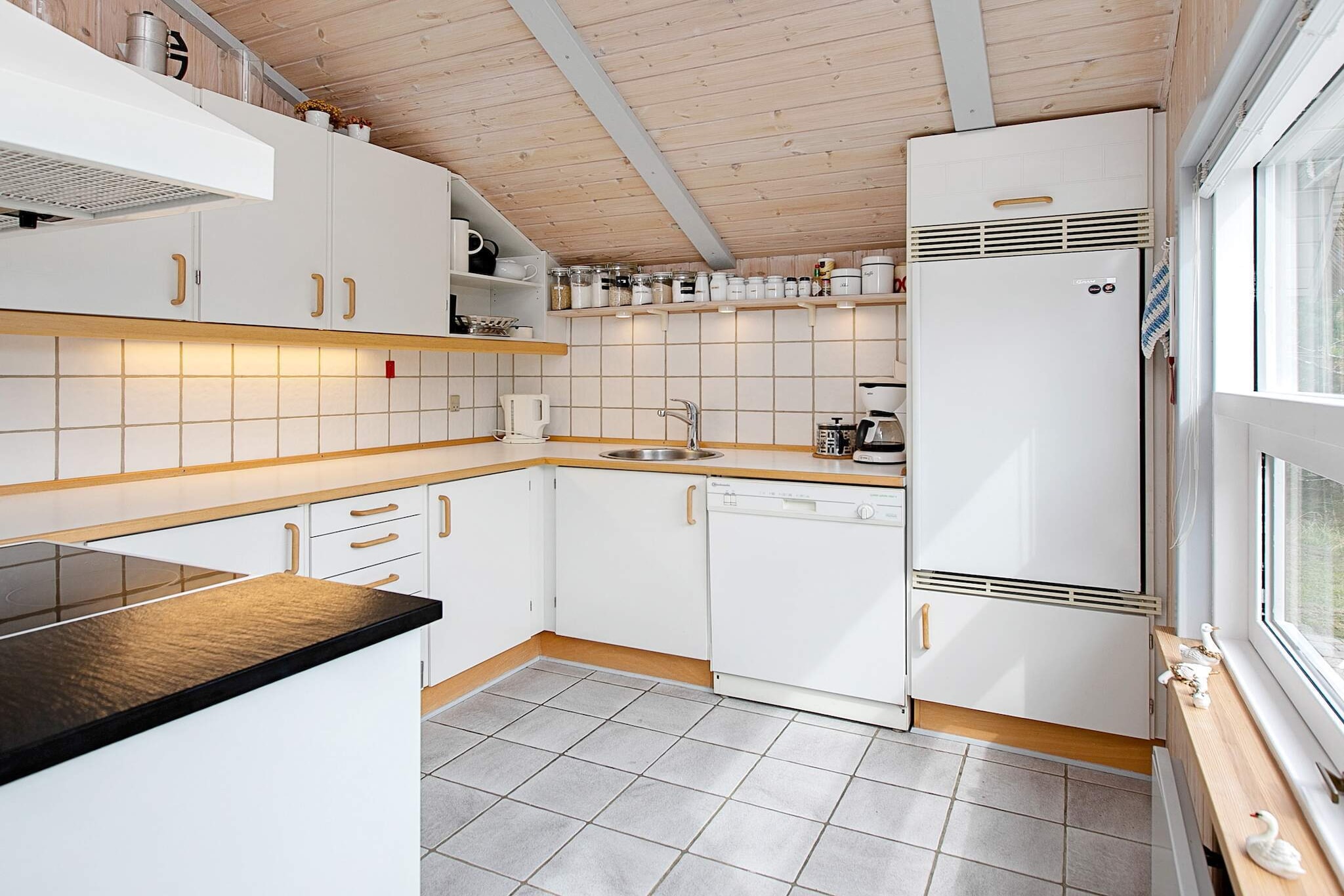 Thatched cottage with sauna and a perfect location in Henne Strand on a large dune plot. The cottage has a large cozy terrace, which gives a feeling of patio. There is a sandbox for the kids. Here the sun can be enjoyed undisturbed all day long sheltered by the dunes in peaceful and quiet surroundings. The roar of the North Sea can be heard from the terraces of the cottage. The living room and family room are a meeting point and invite to coziness for the whole family. The extremely well-kept cottage is also well furnished with 2 rooms with double bed and a room with bunk bed and a nice bathroom with sauna. However, it should be noted that the beds are 140 x 190 and the bunk beds 70 x 190 cm. In the annex there is a football table game. Here it is also possible to make 2 adult beds. Mattresses in the annex are 70 x 190 cm. Not for rent to craftsmen and youth groups.
A refundable deposit might be charged closer to your check-in date. This deposit covers utilities consumed during your stay and any additional services that may be taken. The final amount will be adjusted based on actual meter readings, actual usage of extra services, and any remaining balance will be refunded within 21 days after checkout.