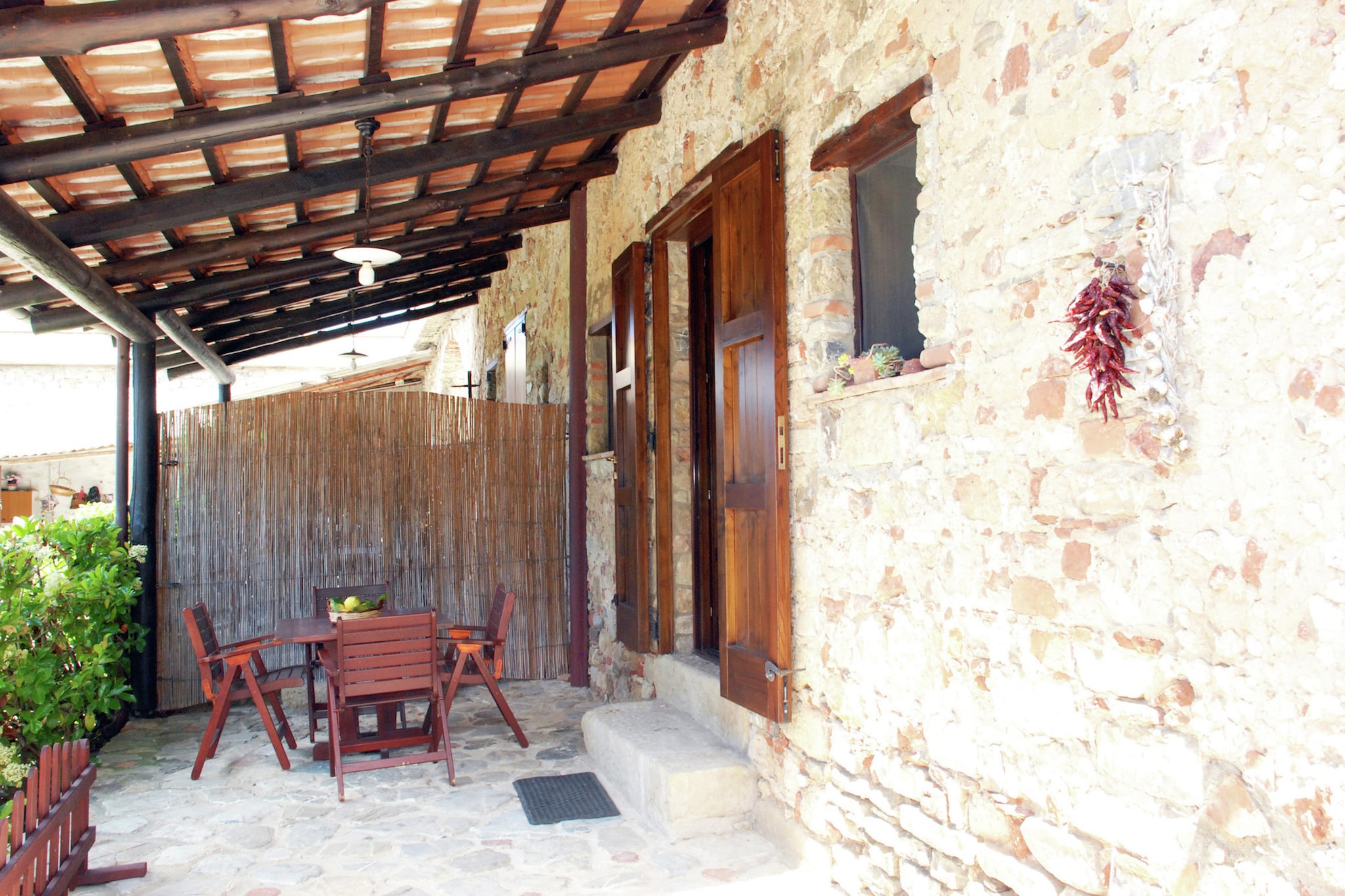 Ground floor: (open kitchen(dining table, hob, fridge, washbasin), bedroom(single sofa bed, double bed, air conditioning), bathroom(shower, washbasin, toilet, bidet), terrace(12 m2), garden(6 m2), garden furniture, sun loungers)\n\ndining table, washing machine(shared with other guests), patio, garden(shared with other guests, 500 m2), garden furniture, sun loungers, BBQ, parking, parasol, bicycles available