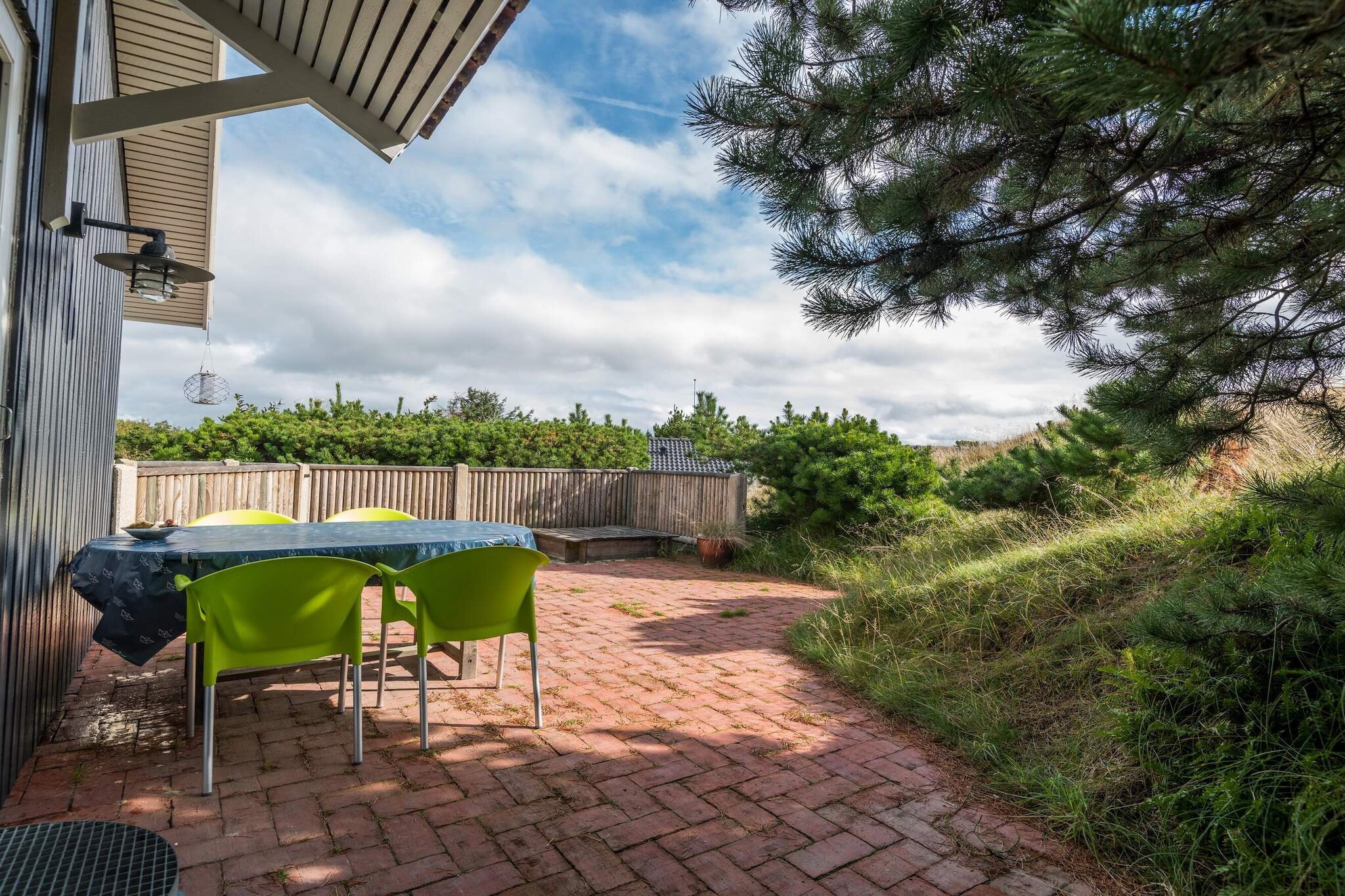 Internet Access DSL, Kitchen(cooker(electric), hood, coffee machine, microwave, dishwasher, fridge, freezer(1-59L)), Living/bed room(TV(cable, german television channels, danish TV channels (DR1 and TV2)), DVD player, radio, CD player, high chair, air to air heatpump), bedroom(double bed), bedroom(double bed), bedroom(single bed), bathroom(tumble dryer, washbasin, shower, toilet, washing machine), Bubble bath(indoor, 2 persons), sauna(indoor, heated, 2 persons), terrace(garden furniture, BBQ, deckchairs), geothermal energy