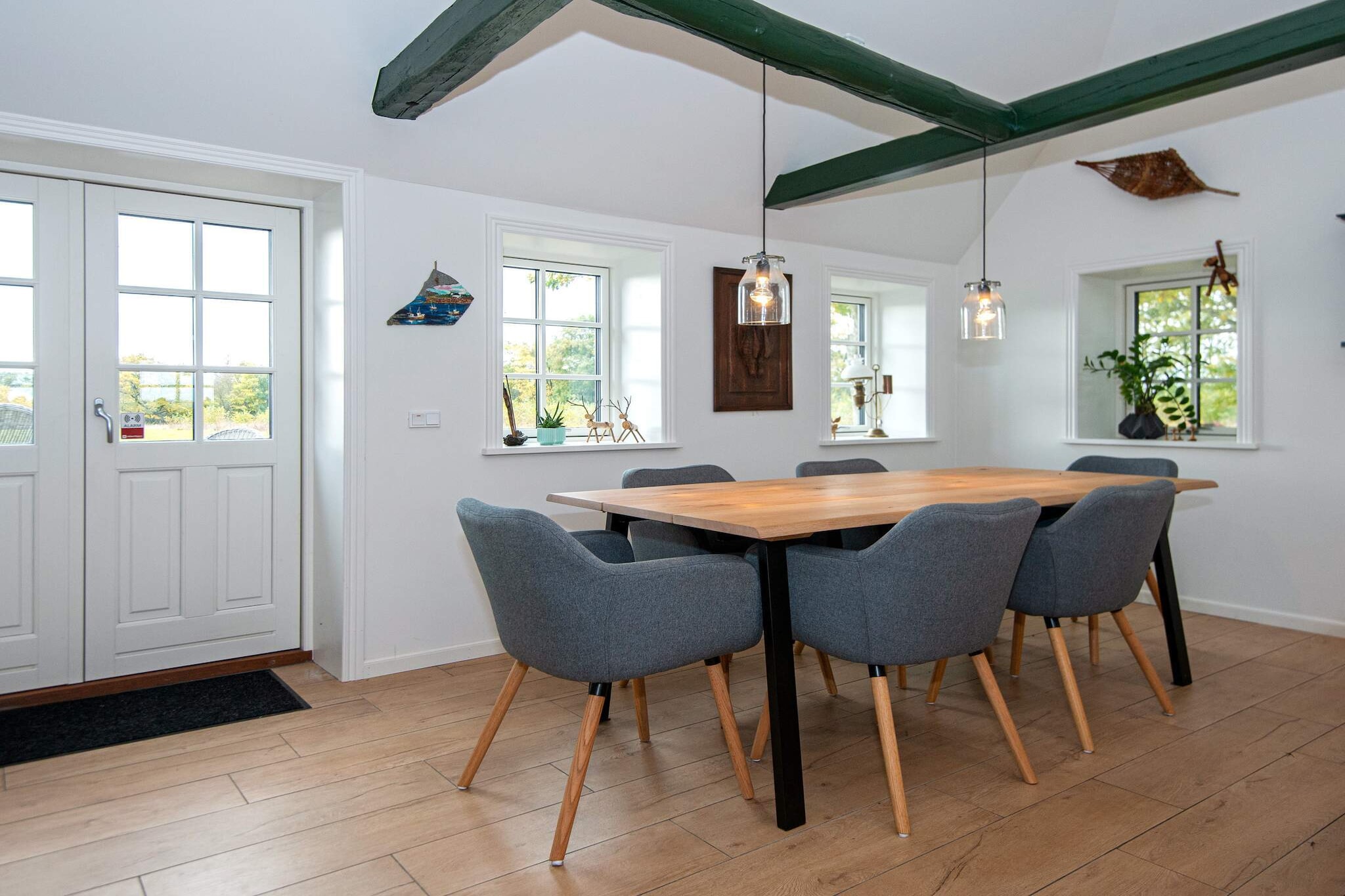 open kitchen(cooker(electric), hood, coffee machine, microwave, dishwasher, fridge-freezer), Living/bed room(TV(german television channels, danish TV channels (DR1 and TV2)), radio), bedroom(double bed), bathroom(floor heating)(tumble dryer, bathtub or shower, washbasin, toilet, washing machine), mezzanine(4x single folding bed), terrace, terrace(roofed), geothermal energy, geothermal energy