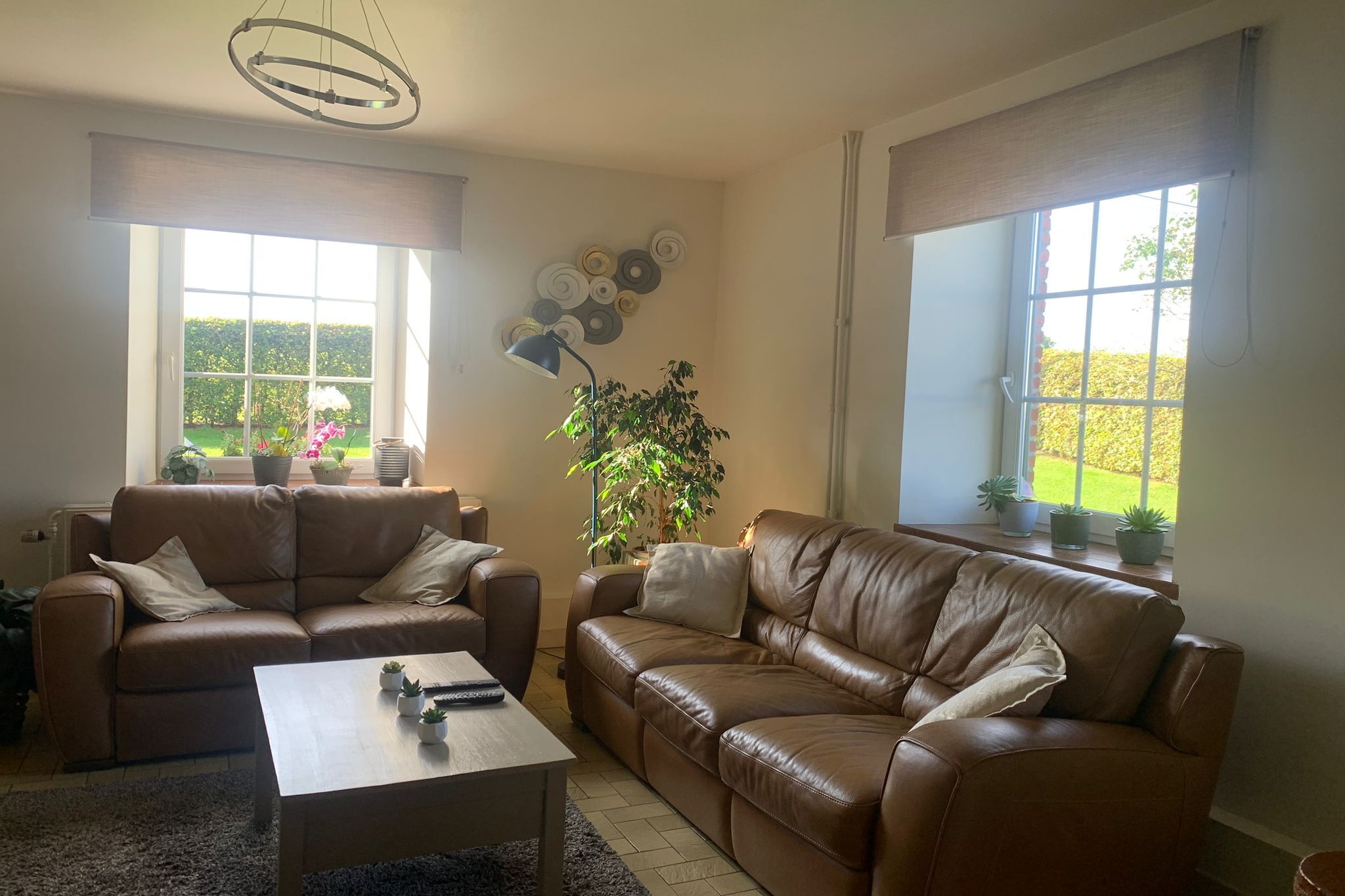 Welcome to Chez Cyrille, a charming farmhouse nestled in the peaceful countryside of Houffalize, Luxembourg, Belgium. Surrounded by rolling fields and the gentle sounds of nature, this cozy retreat invites you to wake up to the mooing of cows and chirping birds, a true rural delight.
The home features a beautiful garden and a dreamy furnished patio, perfect for relaxing, dining al fresco, or capturing postcard-worthy moments. Inside, enjoy the comfort of WiFi, a washing machine, and central heating to keep things warm and cozy year-round. The well-equipped kitchen makes home-cooked meals a breeze, and outdoor amenities like a barbecue, terrace, and lush lawn add to the charm. A cot and high chair are available for little ones, making this a perfect family-friendly escape.
Explore the scenic surroundings on foot or by bike, or visit nearby towns like Vellereux, Bertogne, and Compogne. The Ourthe River, just 1 km away, is ideal for fishing or a peaceful riverside stroll. Kids will love the swing set, while adults can unwind on the garden furniture with a drink in hand.