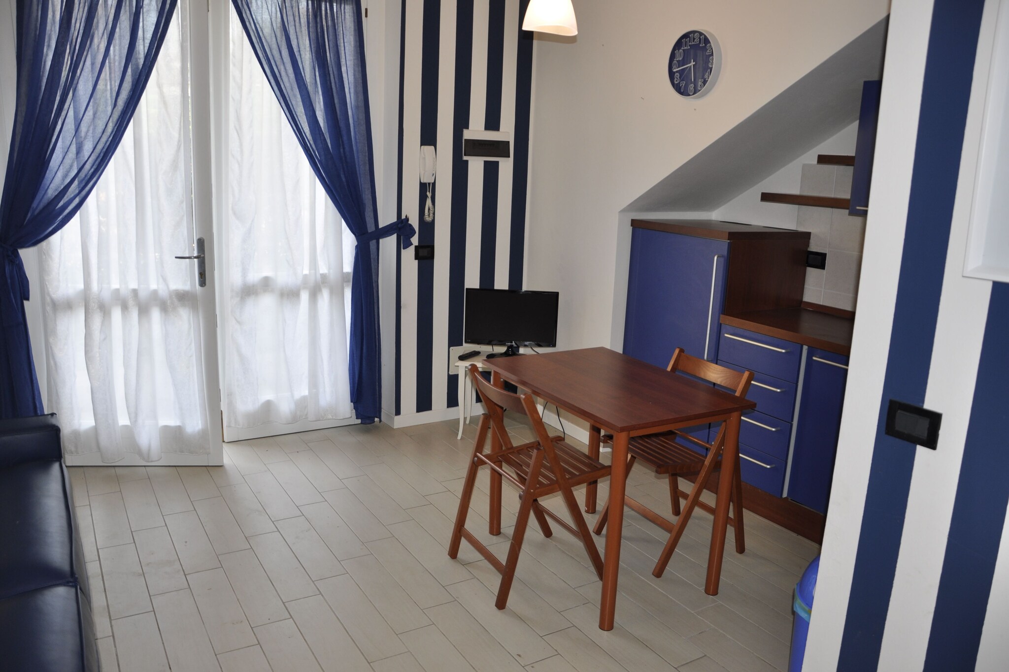 Ground floor: (open kitchen, Living/bed room(single sofa bed, double bed or 2 single beds, TV(satellite)), bathroom(shower, washbasin, toilet, bidet), dishwasher, heating(central, gas), air conditioning, terrace)\n\ngarage, washing machine, garden(shared with other guests), garden furniture, swimming pool(shared with other guests, including part for children (depth 50cm), 16 x 8 m., opened from Jul upto and including 1/2 Sep)