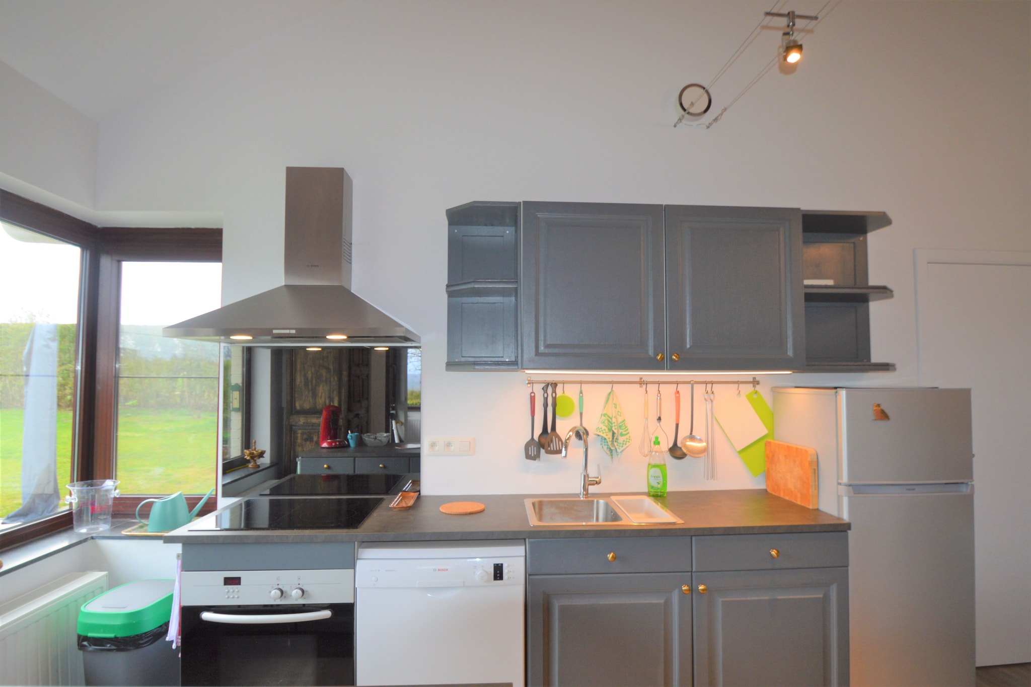 Ground floor: (Entrance, Sitting room(TV(flatscreen, digital), decorative fireplace, seating area(8 persons)), dining room(dining table(8 persons)), open kitchen(bar, electric kettle, toaster, cooker(4 ring stoves, induction), hood, coffee machine, oven(grill-oven), microwave, dishwasher, fridge-freezer), bedroom(double bed(twin duvet, twin fitted sheet, 160 x 200 cm)), bedroom(double bed(twin duvet, twin fitted sheet, 140 x 200 cm)), bathroom(shower, washbasin), sanitary facility(toilet))\n\nOn the 1st floor: (Study(seating area), mezzanine, library, party games)\n\nGuest house ground floor: (Entrance, hallway, bedroom(2x single bed(duvet, fitted sheet, 90 x 200 cm), bunk bed(duvet, fitted sheet, 90 x 200 cm)), bathroom(Bubble bath, shower, washbasin, toilet))\n\nterrace, garden, bicycle storage, garden furniture, BBQ, parking, boules court, play equipment, water from well