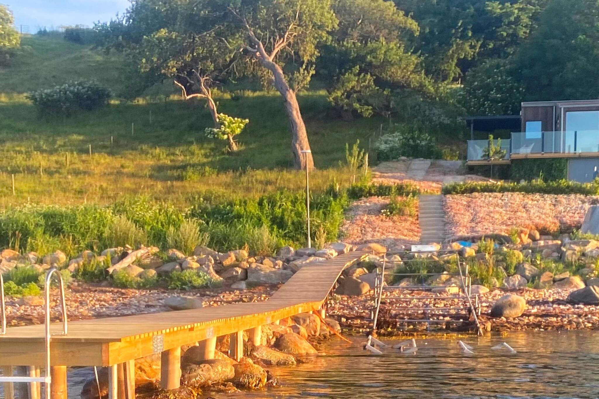 Boat: \n\nInternet Access DSL, Living room, Kitchen(stove(2 ring stoves), hood, coffee machine, oven, microwave, dishwasher, fridge-freezer), Living/bed room(TV(swedish TV channels), netflix), bedroom(double bed), bedroom(double bed, bunk bed), bedroom(single bed, single folding bed, 2x bunk bed), bathroom(washbasin, shower, toilet, air to water heatpump), bath tub(outside), terrace(garden furniture, BBQ), parking