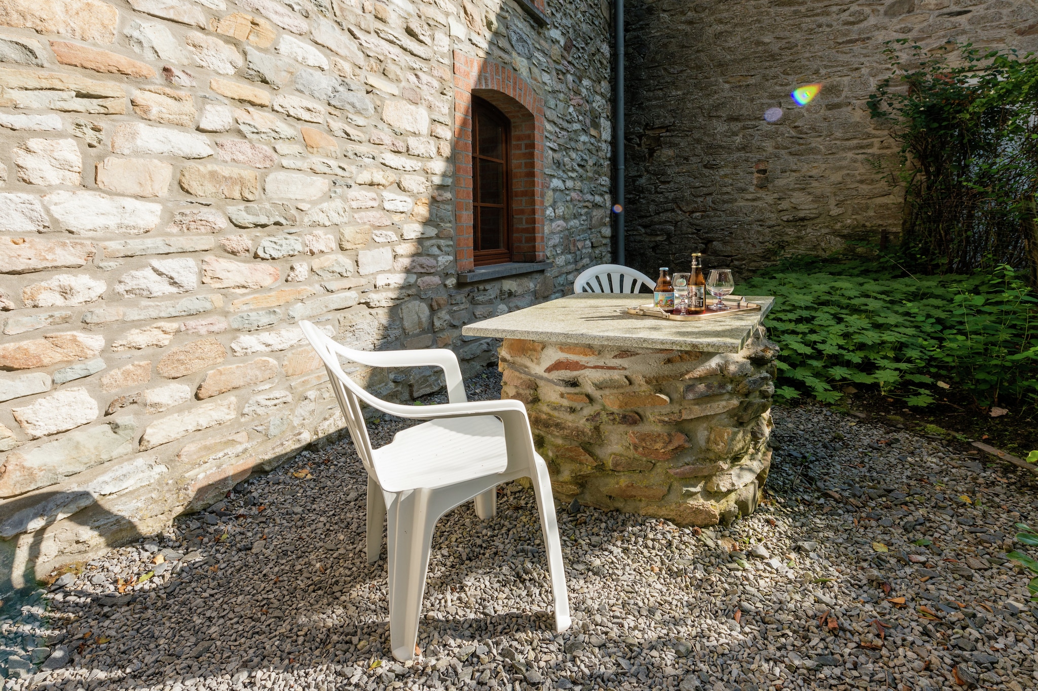 This holiday home in Vielsalm has 6 bedrooms and accommodates 14 people. It is perfect for a group or families with children to stay enjoying the furnished garden and barbecue. The living room comes with a TV and DVD player for entertainment during the evening. There is a spacious dining room for the whole group to have food together. Kids can use the children's bed and high chair. 

The garden is privatized for you and partially fenced (except the side facing the street). There is a parking space for three cars in front of the house, and another space at the back.

The hilly landscape is ideal for hiking and biking enjoying the beautiful sights. There are a zoo and an ostrich farm to visit with your kids. The ski runs of Baraque de Fraiture at 13 km and the waterfalls of Coo at 20 km are perfect for a skiing adventure. You can find some good restaurants at 3 km and the town center at 200 m provides you all fun and excitement. 
Public transport is at 300 m and train station is at 5 km.

The home does not entertain youth groups.
