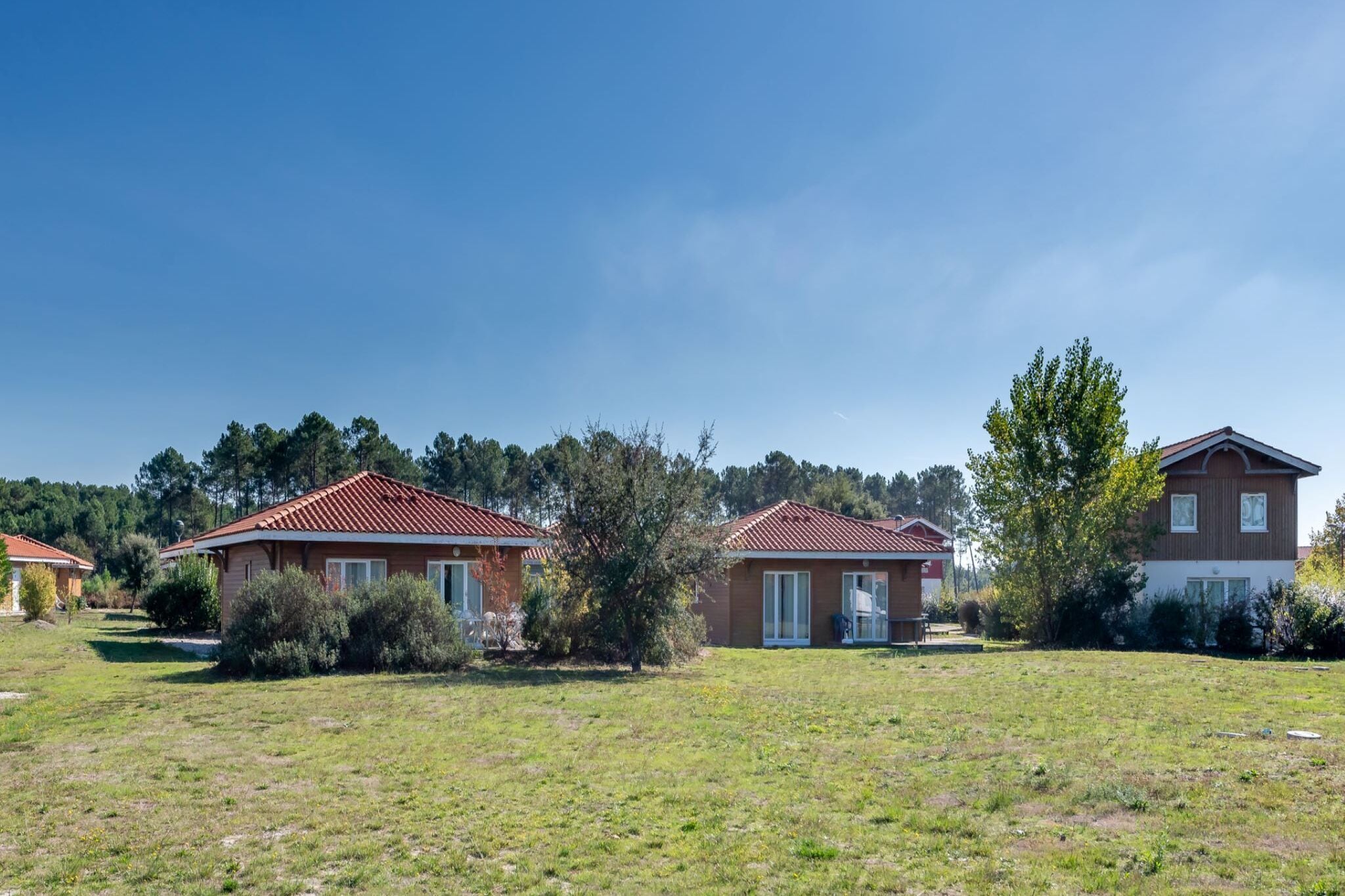 Neat houses near a beautiful lake in sunny Les Landes