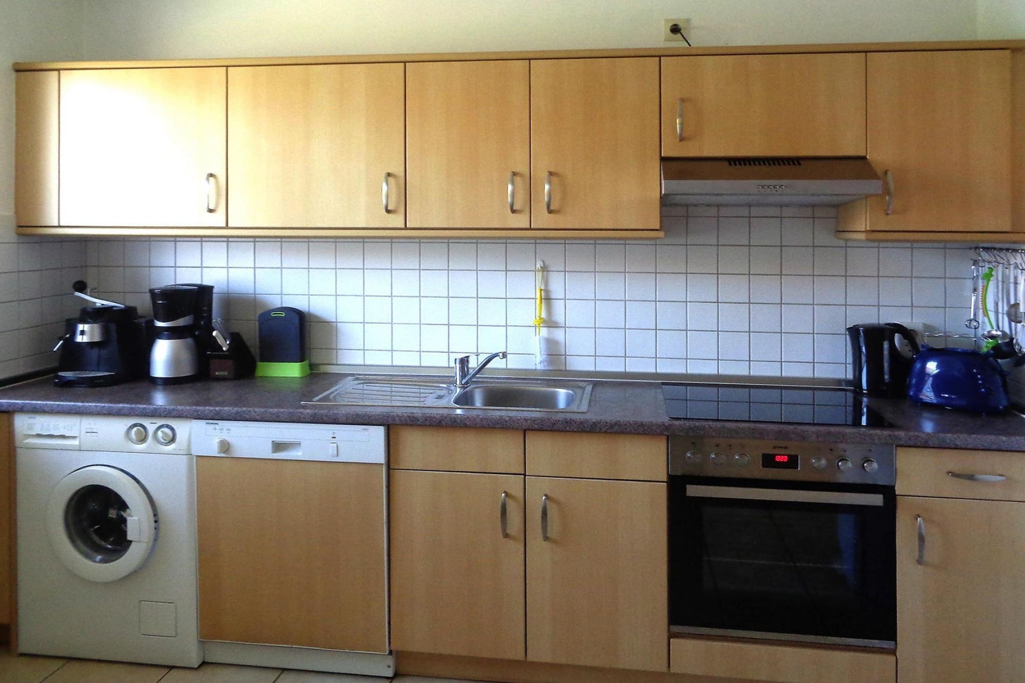 Ground floor: (Kitchen(4x hob(ceramic), electric kettle, coffee machine, coffee machine(espresso), oven, microwave, dishwasher, fridge-freezer, washing machine), Living/diningroom(TV(satellite), dining table, DVD player, stereo unit, heating(gas)), guest toilet)\n\nOn the 1st floor: (bedroom(double bed, TV(satellite)), bedroom(double bed), bedroom(2x single bed), bathroom(shower, washbasin, toilet))\n\ngrill, terrace, garden furniture, parking, parking, high chair, Swing set, baby crib(free), Laundry Package for a fee