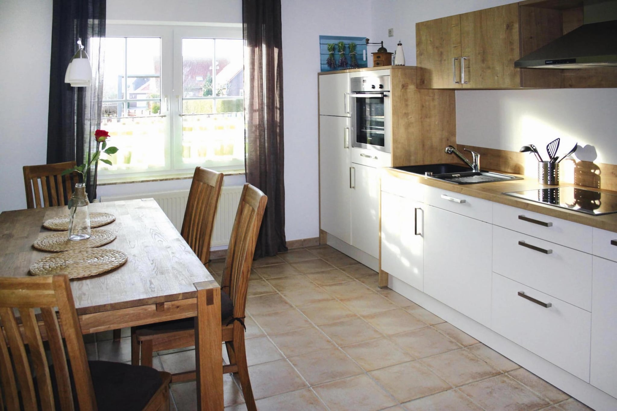 Ground floor: (Kitchen(stove, electric kettle, toaster, coffee machine, oven, dishwasher, fridge), Living/diningroom(TV, dining table, seating area, radio, CD player), guest toilet)\n\nOn the 1st floor: (bedroom(double bed), bedroom(2x single bed), bedroom(double bed), bathroom(bath tub, shower, toilet))\n\nwashing machine, heating, parking, high chair, baby crib(free), Towels/Sheets (extra fee)