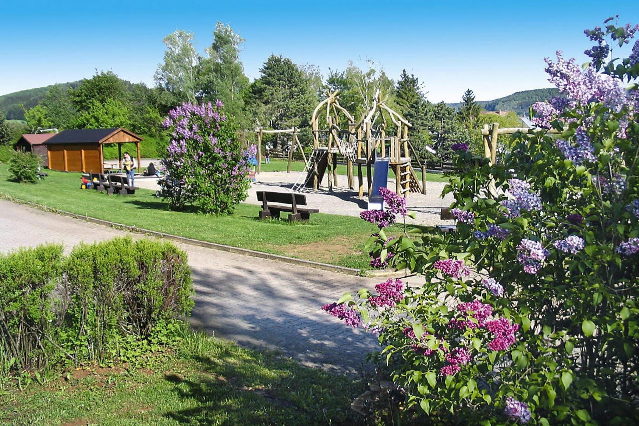 Feriendorf Öfingen - 68 qm Typ C Sioux - Tuinen zomer