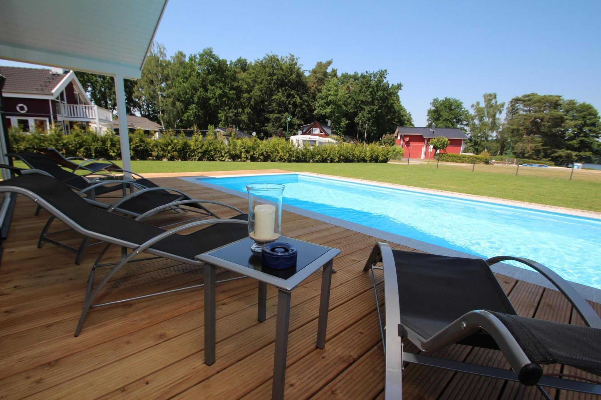 Escape the everyday and immerse yourself in holiday bliss! In this newly built wellness holiday home with its own outdoor pool, sauna, and whirlpool, the worries of daily life are quickly forgotten, and you can enjoy pure relaxation. With its direct and unobstructed view of Lake Dümmer in the heart of the Schwerin Lake District, you can experience nature at every turn – see, hear, and feel it. Enjoy it from the spacious terrace in summer and in front of the cozy fireplace in the holiday home during winter. In case of bad weather, an activity house with a pool table, darts, and a comfortable lounge area is available! In the state capital of Schwerin, you can experience the city atmosphere and discover a wealth of interesting sights and attractions. The castle with its gardens, Schwerin Cathedral, and the Schwerin State Theatre are all worthwhile destinations.
Highlights included: Final cleaning, Wi-Fi, 1 rowboat (May 1st - October 31st)
The region around Lake Dümmer is not only a wonderful recreational area but also the perfect starting point for excursions. Swimming is possible at the shallow, child-friendly beach and from the jetty at Lake Dümmer, as are boat trips and fishing excursions by rowboat. However, the beautiful surroundings are best explored by hiking, cycling, or inline skating. An almost 15 km long, first-class cycle path leads directly from Dümmer to Wittenburg, where you'll also find an adventure park with a climbing park, an indoor ski slope, and a quad and go-kart track.
Please note: The pool is closed from November to March due to weather conditions!
This holiday home is available for recreational purposes only. Bookings made on behalf of companies will be canceled, and any applicable cancellation fees will be charged. Groups of young people and men are not permitted.
Linen packages are not included in the rental price. These can be booked optionally in advance through Belvilla (EUR 25 per person/change).