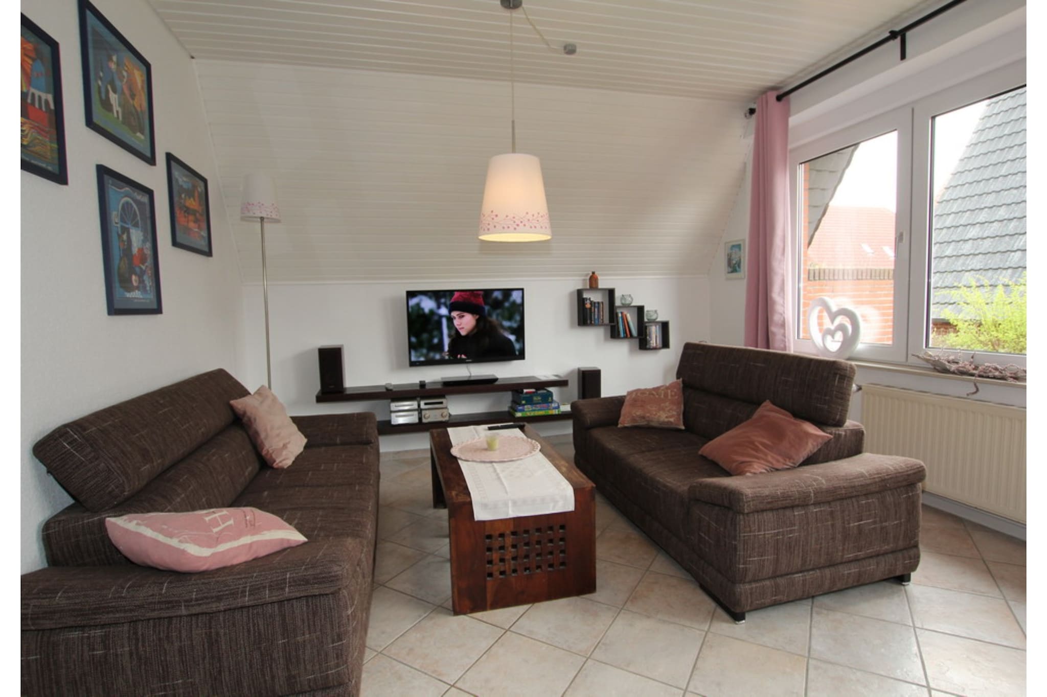 Ground floor: (Kitchen(stove, oven, microwave, fridge, fridge-freezer), Living/diningroom(TV(satellite), DVD player, radio, CD player, stereo unit), bedroom(double bed), bathroom(shower, washbasin, toilet))\n\nOn the 1st floor: (bedroom(double bed), bedroom(2x single bed), toilet(washbasin, toilet))\n\ngarage, heating(gas), terrace, bicycle storage, garden furniture, parking