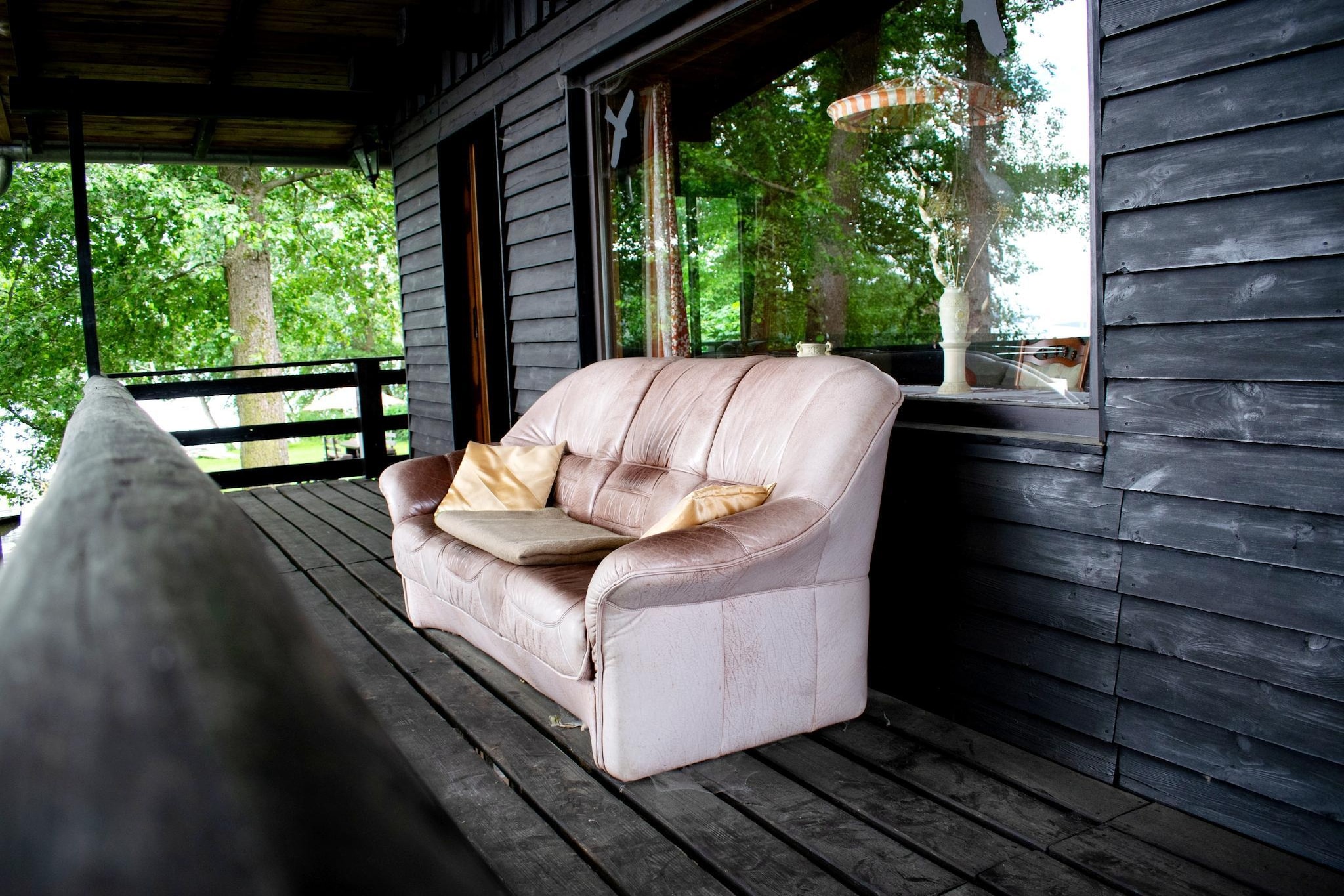 Ferienhaus am See-Terrasbalkon