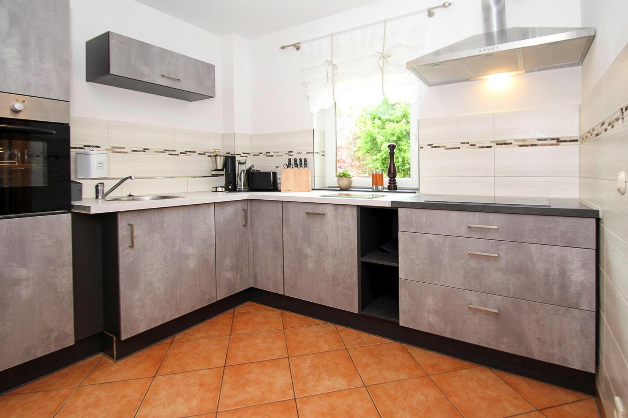 Kitchen(dining table, hob(ceramic), hob(ceramic), hob(ceramic), hob(ceramic), electric kettle, toaster, coffee machine, oven, microwave, dishwasher, fridge-freezer), Living/bed room(2x single bed, TV(satellite), radio), bedroom(double bed), bathroom(bath tub, shower, toilet, hairdryer), seating area, grill, bathtub or shower, heating(gas), terrace, garden furniture, BBQ, parking, parasol, table tennis table, bicycles available, high chair, baby crib(free), Towels/Sheets (extra fee)