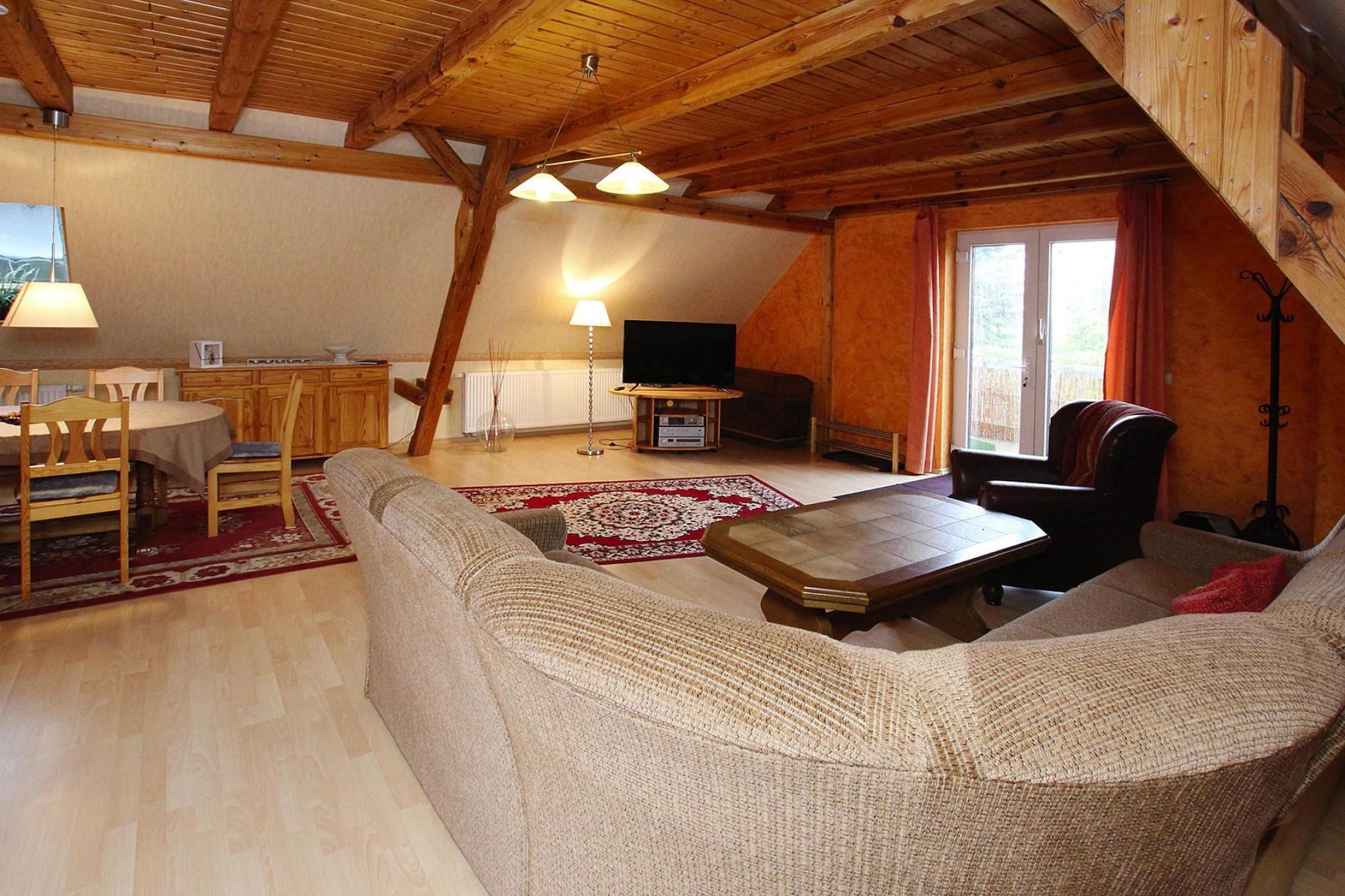 On the 1st floor: (open kitchen(hob(4 ring stoves, ceramic), electric kettle, toaster, coffee machine, oven, microwave, dishwasher, fridge(+ freezer)), Living/diningroom(double sofa bed, TV(satellite), DVD player, radio, CD player), bedroom(single bed, double sofa bed), open sleeping areas(double bed), bathroom(shower, toilet, bidet), single bed)\n\nLocal products for sale, grill, balcony, heating(central), garden, bicycle storage, garden furniture, parking, sand pit, high chair, Swing set, baby crib(free), Sheets incl.