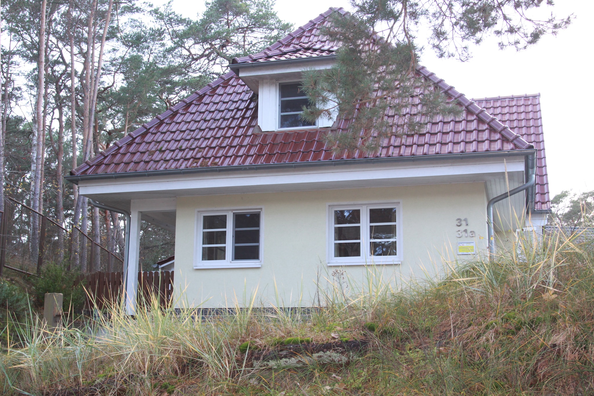 Extremely comfortable semi-detached house, completely renovated in spring 2022, just 100 m from the fine sandy beach. Your home is located on a 200 m² natural plot of land directly in the dune belt on a traffic-calmed private road directly in the coastal forest.
Due to the new, modern and very tasteful furnishings, you can spend a really great holiday here. The new fitted kitchen has everything you need to prepare a great meal. Relax on the large terrace with a cozy barbecue evening. The two newly equipped bathrooms are particularly worth mentioning. New showers and of course newly tiled - a great feel-good factor has been created here for the guests.
In the traffic-calmed zone, children can also go to the beach without fear and get an ice cream on the way there. The beach house with its two halves is perfect for families of friends (2nd half of the house: DOS08004). Trassenheide has a direct connection to the cycling and hiking network on the island of Usedom. The fine, white, groyne-free sandy beach has a gently sloping shore zone, so that even younger guests can safely look for shells and splash around in the water. Families with children especially feel at home here. You can quickly reach the stop of the Usedomer Bäderbahn, which runs to the Kaiserbäder.
 
Highlights included:
WIRELESS INTERNET ACCESS
Sauna for private use
1 free parking space
Activities nearby: The best way to explore the area around Trassenheide is on the well-developed network of cycling and hiking trails. The longest hiking trail on Usedom runs directly through Trassenheide. There are numerous sights to see on the way from Peenemuende to the city of Usedom. To take a break, stop off at one of the inviting restaurants or cafes. The leisure and sports program in Trassenheide is very diverse. So you can sail, surf, beach volleyball