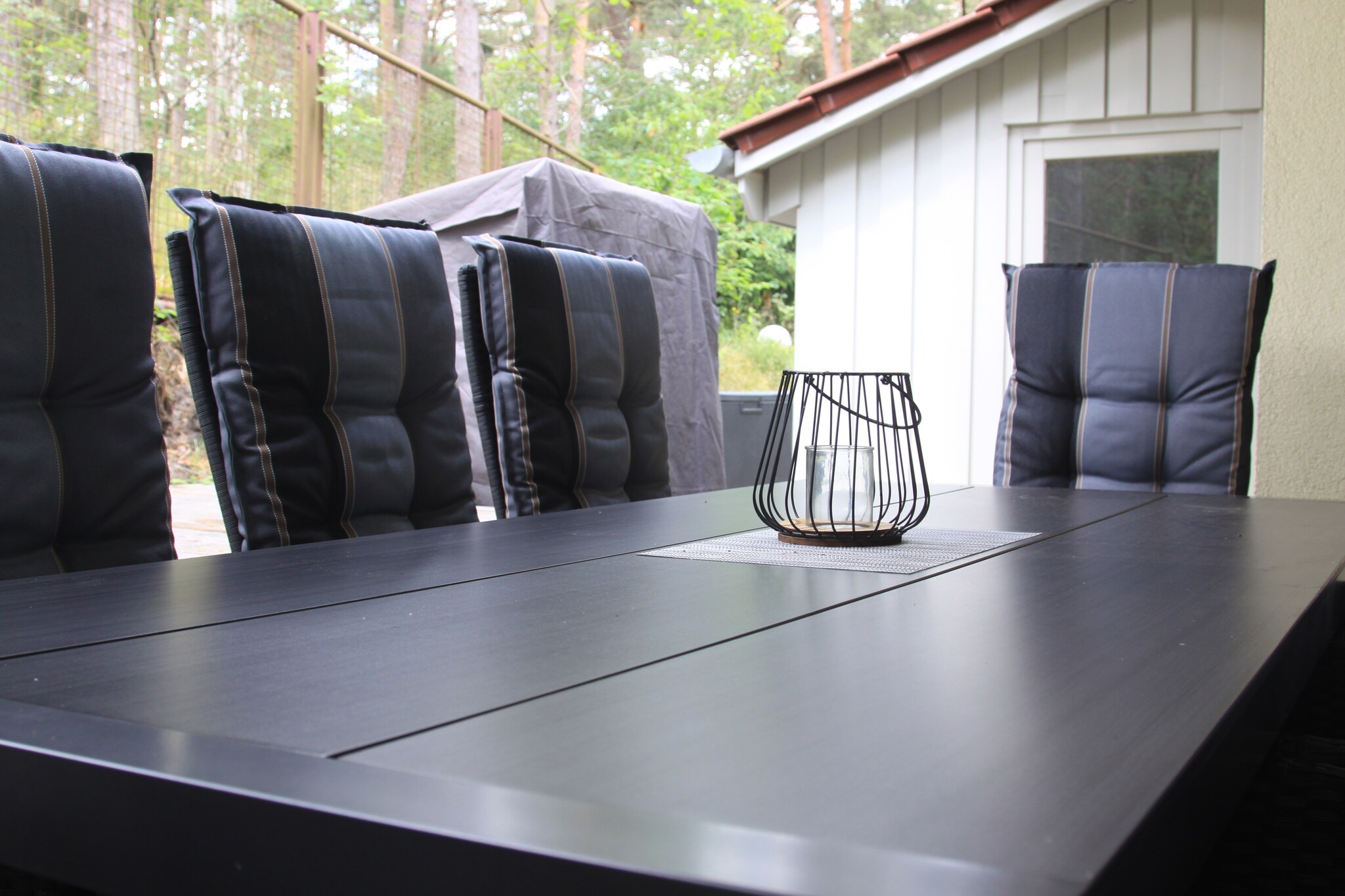 Ground floor: (open kitchen(dining table, hob(4 ring stoves, ceramic), electric kettle, toaster, hood, coffee machine, oven, microwave, dishwasher, fridge-freezer), Living/diningroom(TV(satellite), radio, CD player, heating(floor heating), heating(electric)), bedroom(double bed), bathroom(shower, washbasin, toilet))\n\nOn the 1st floor: (bedroom(double bed), bedroom(2x single bed, TV), bathroom(shower, 2x washbasin, toilet))\n\nAttic: (open sleeping areas(single bed), single bed)\n\nsauna(private), washing machine, terrace, garden furniture, parking, high chair, baby crib(paid), Towels/Sheets (extra fee)