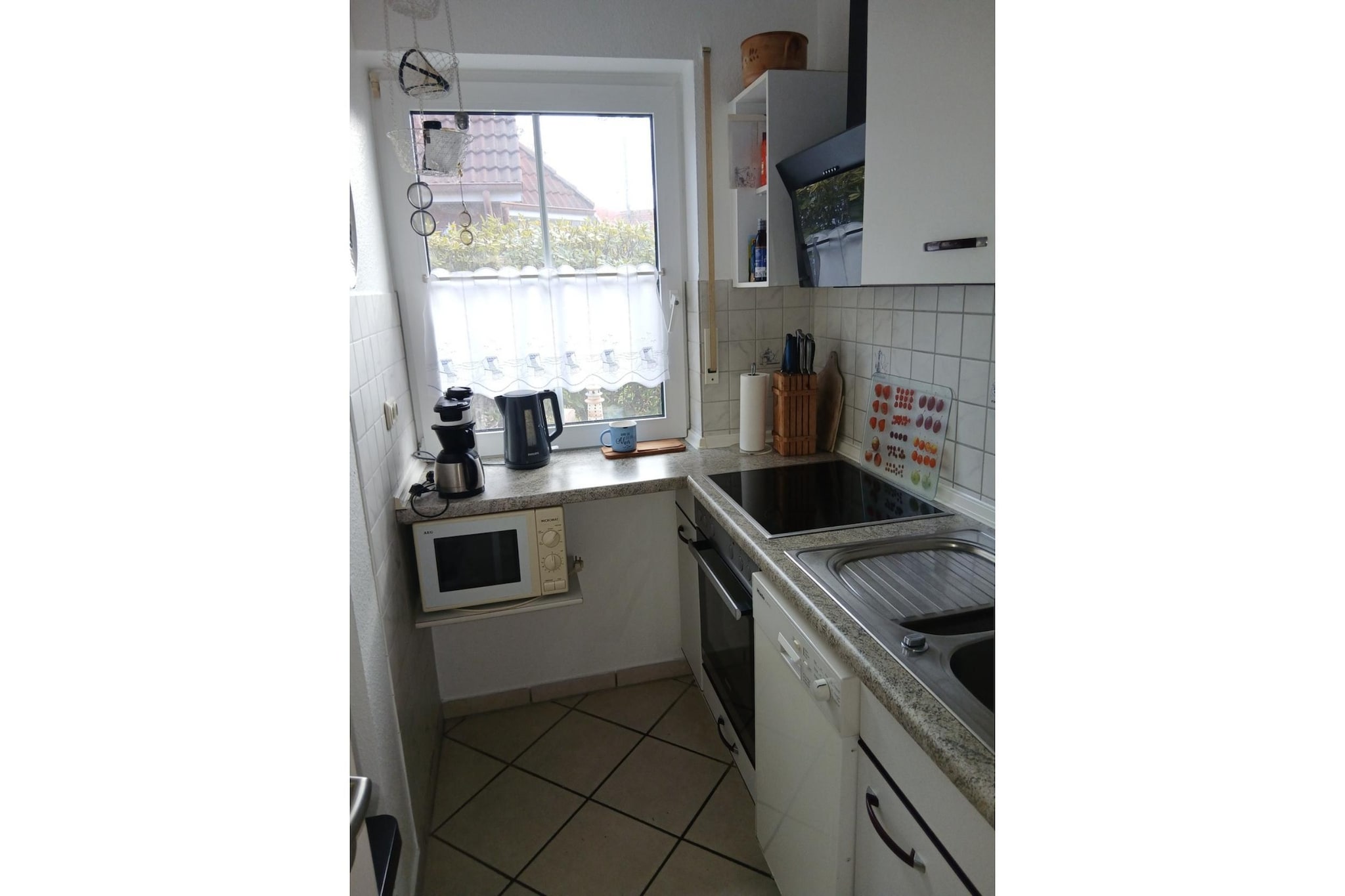 Ground floor: (Kitchen(electric kettle, toaster, cooker(4 ring stoves), coffee machine, oven, microwave, dishwasher, fridge), Living/diningroom(TV(satellite), DVD player, phone docking station, radio, CD player, stereo unit), toilet(washbasin, toilet))\n\nOn the 1st floor: (bedroom(double king size bed), bedroom(2x single bed), bathroom(shower, washbasin, toilet))\n\nwashing machine, heating(central), terrace, garden, bicycle storage, garden furniture, parking, high chair, baby crib(free)