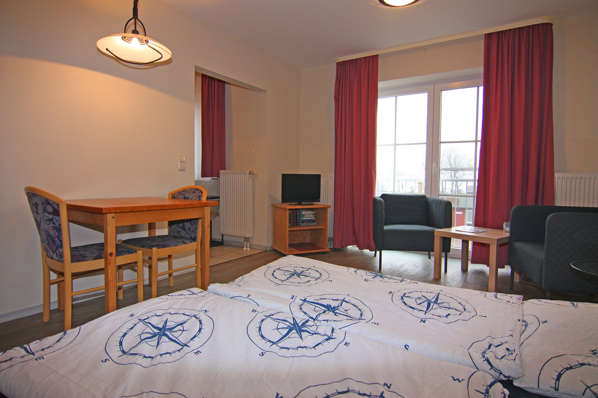 On the 1st floor: (open kitchen(hob(4 ring stoves, electric), electric kettle, toaster, hood, coffee machine, oven, dishwasher, fridge(+ freezer), Hand blender), Living/bed room(double bed, TV(cable), dining table(2 persons), radio), bathroom(shower, washbasin, toilet), Landing)\n\ngarage, tumble dryer(shared with other guests, paid), washing machine(shared with other guests, paid), heating, high chair, baby crib(free), Towels/Sheets (extra fee)