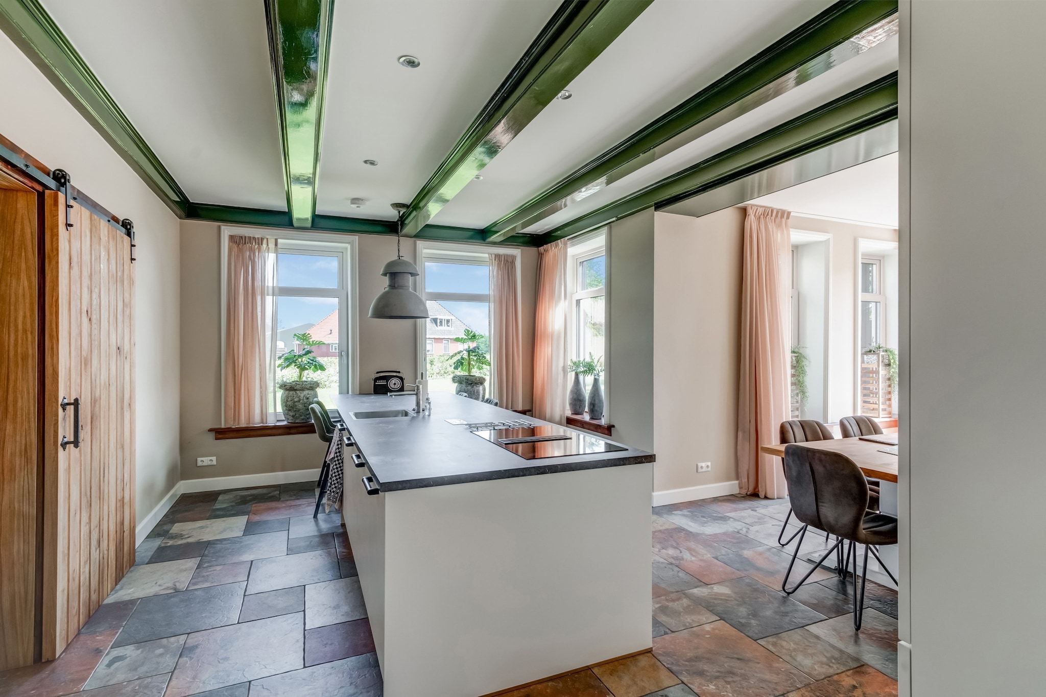 Ground floor: (Living room(TV, seating area), Kitchen(TV, electric kettle, coffee machine(filter), combination microwave, dishwasher), bedroom(double bed), bathroom(shower, washbasin, washbasin, hairdryer), toilet(washbasin, toilet, urinal), washing room(washing machine), coffee machine)\n\nOn the 1st floor: (bedroom(single bed, single bed, insect screens), bedroom(double bed, TV, seating area, insect screens), bedroom(double bed, insect screens), bedroom(double bed, insect screens), bathroom(shower, washbasin, toilet))\n\ncot, Bubble bath, garden doors, terrace(roofed), terrace, garden, garden furniture, BBQ, parking, high chair, Charging post for electric cars