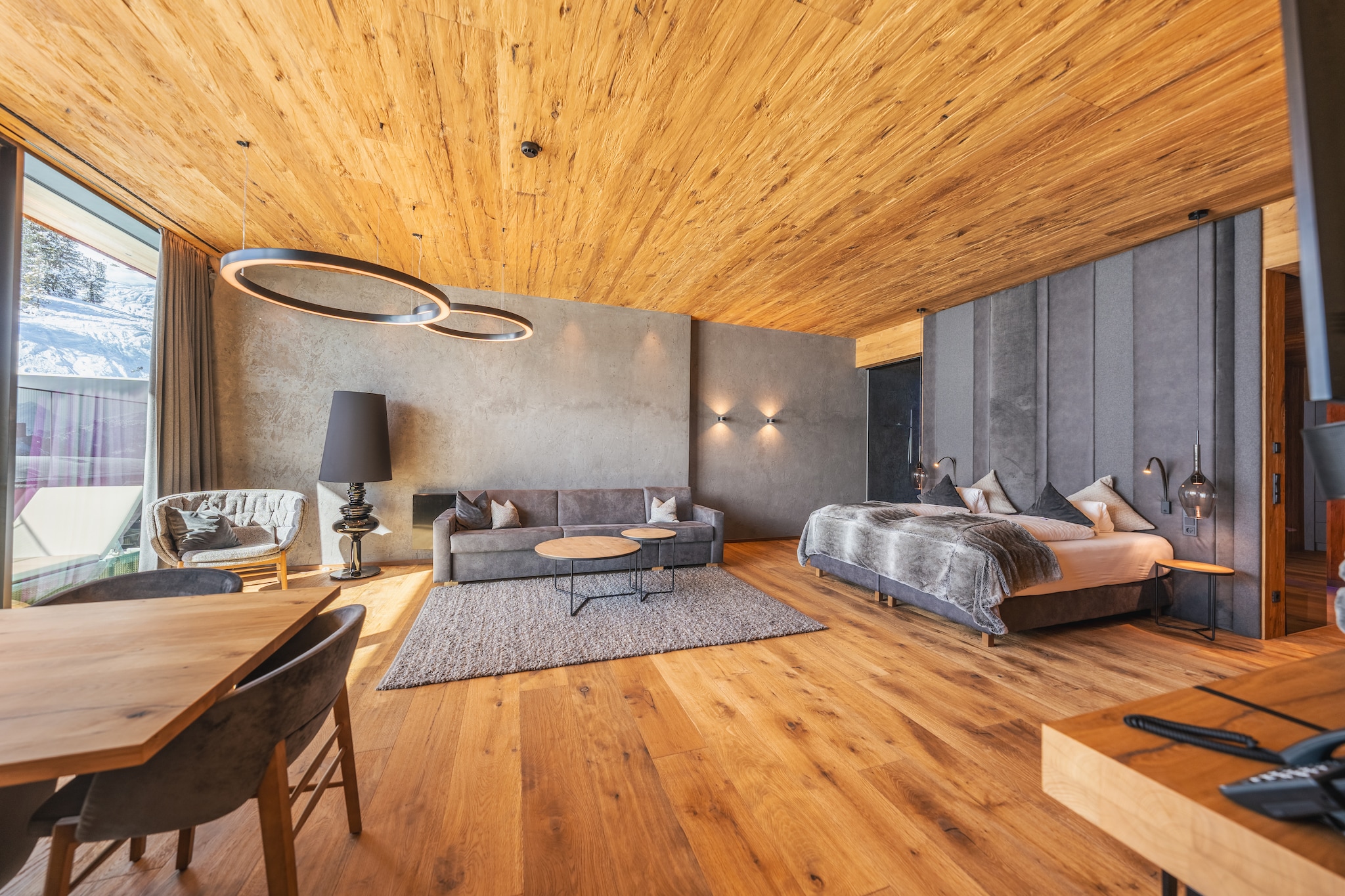 On the 1st floor: (Living room(double bed, TV(satellite), dining table, seating area, stereo unit), open kitchen(hob(4 ring stoves, ceramic), electric kettle, espresso machine, oven, dishwasher, fridge-freezer), bedroom(double bed, shower, washbasin, washbasin), bathroom(bath tub, shower, washbasin, washbasin, toilet, hairdryer), toilet, Sauna, Garden Furniture )\n\nparking