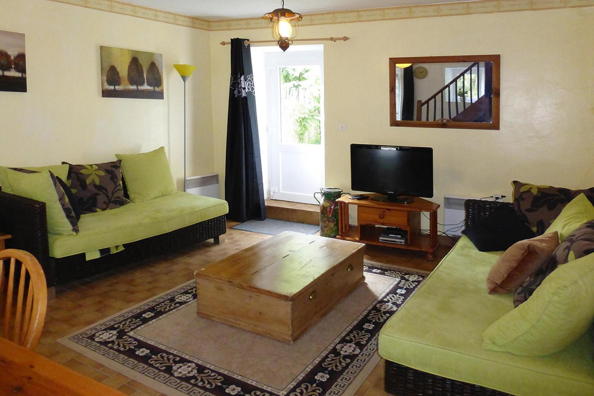 Ground floor: (open kitchen(electric kettle, toaster, cooker(4 ring stoves, electric), coffee machine(filter), oven, microwave, fridge, freezer), Living/diningroom(TV(satellite, german television channels), DVD player))\n\nOn the 1st floor: (bedroom(double bed(140 x 190 cm)), bedroom(single bed(90 x 190 cm), single bed(90 x 190 cm)), bathroom(bath tub, toilet))\n\ncarport, seating area, tumble dryer, baby bath, washing machine, heating(electric), garden(private, 60 m2), garden furniture, parasol, high chair, baby crib(free)