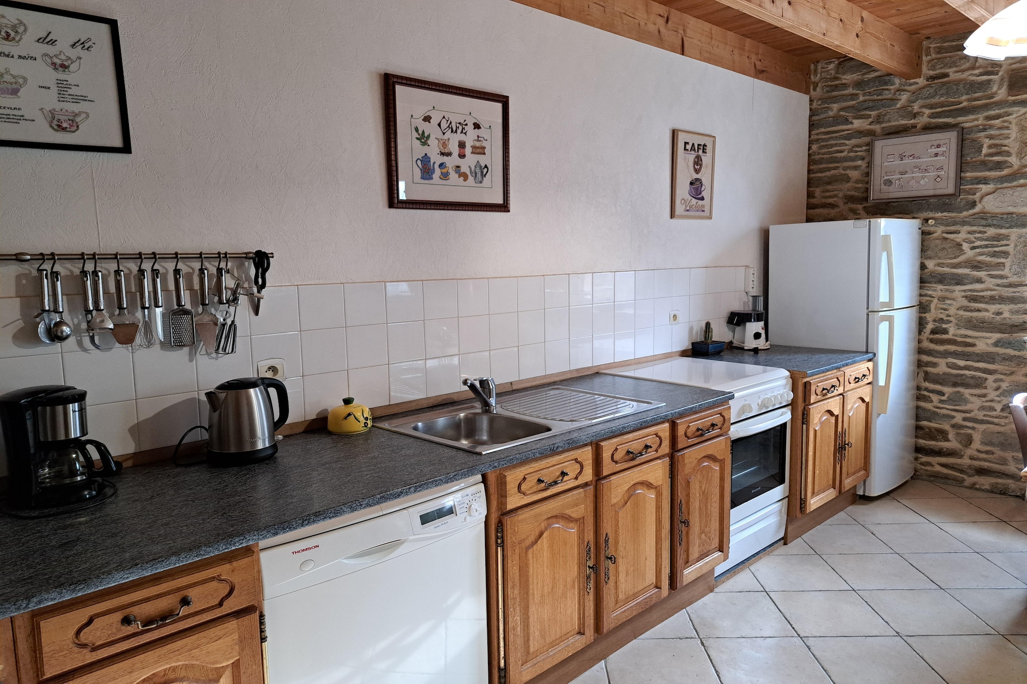 Ground floor: (open kitchen(electric kettle, toaster, cooker(4 ring stoves, gas), coffee machine, oven, microwave, dishwasher, fridge-freezer), Living/diningroom(TV(satellite, german television channels), fireplace, radio, CD player), toilet)\n\nOn the 1st floor: (bedroom(double bed(140 x 190 cm)), bedroom(double bed(140 x 190 cm)), bathroom(bath tub, toilet))\n\nOn the 2nd floor: (bedroom(single bed(90 x 190 cm), double bed(140 x 190 cm)))\n\ngarage, cot, washing machine, heating(oil), terrace(20 m2), garden(500 m2), bicycle storage, garden furniture, sun loungers, parking, parasol, high chair