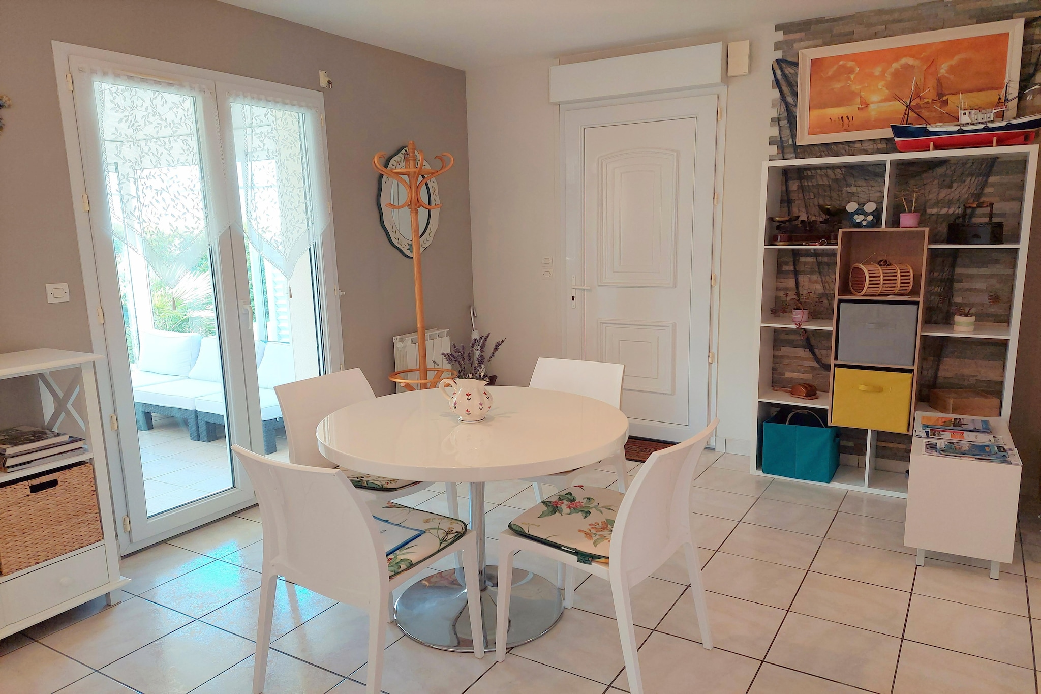 Ground floor: (open kitchen(electric kettle, toaster, coffee machine(pads), coffee machine, oven, microwave, dishwasher, fridge-freezer), Living/diningroom(TV(no german television channels), dining table, radio, CD player, heating(electric)), bedroom(double bed(160 x 200 cm)), bathroom(shower), toilet)\n\nAttic: (bedroom(single bed(90 x 190 cm), double bed(140 x 190 cm)), bathroom(shower, toilet))\n\nveranda, cot, washing machine, patio, terrace, garden, garden furniture, sun loungers, BBQ, parking, parasol, ironing board