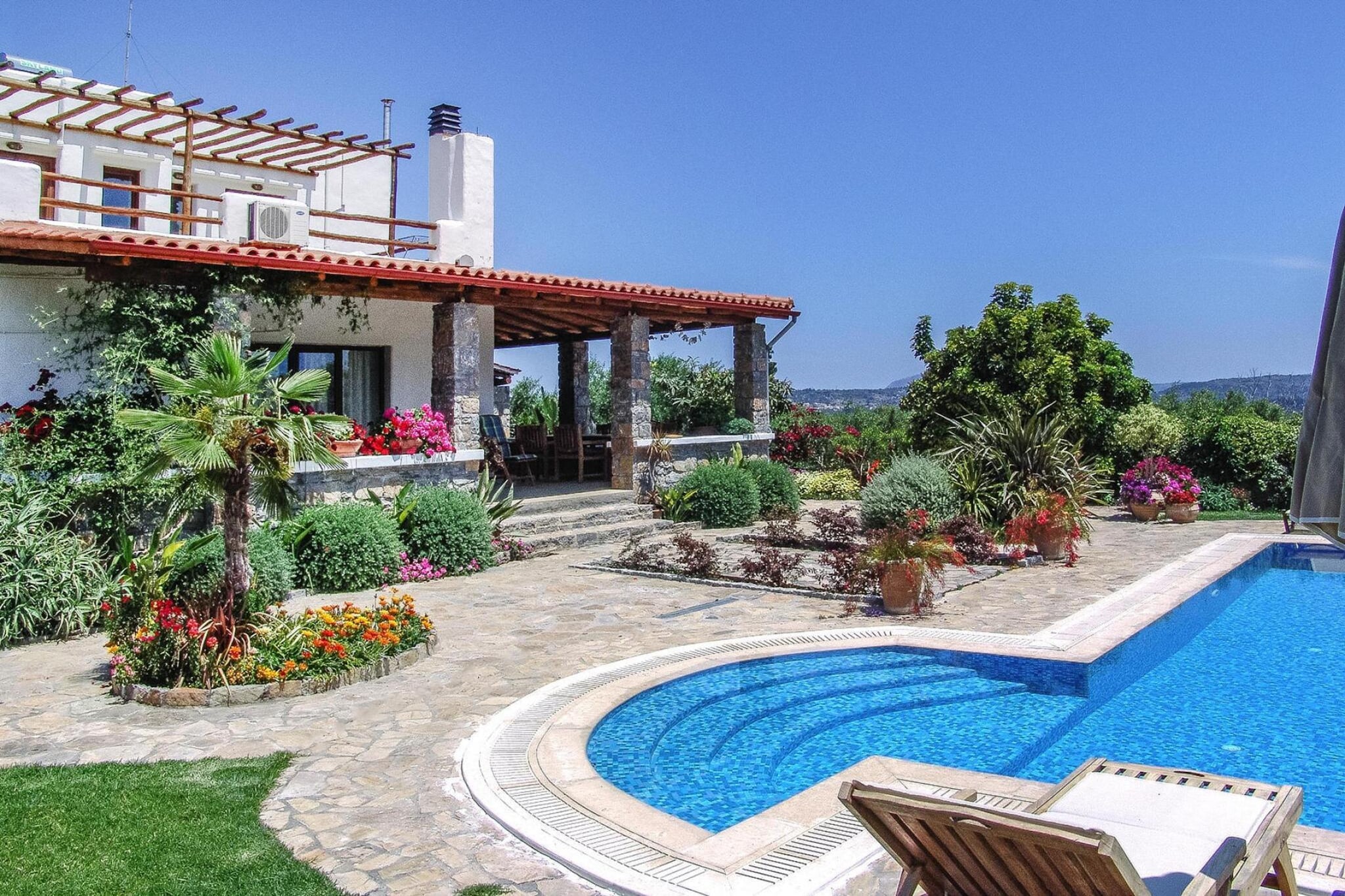 Holiday home, Pemonia--Buitenkant zomer