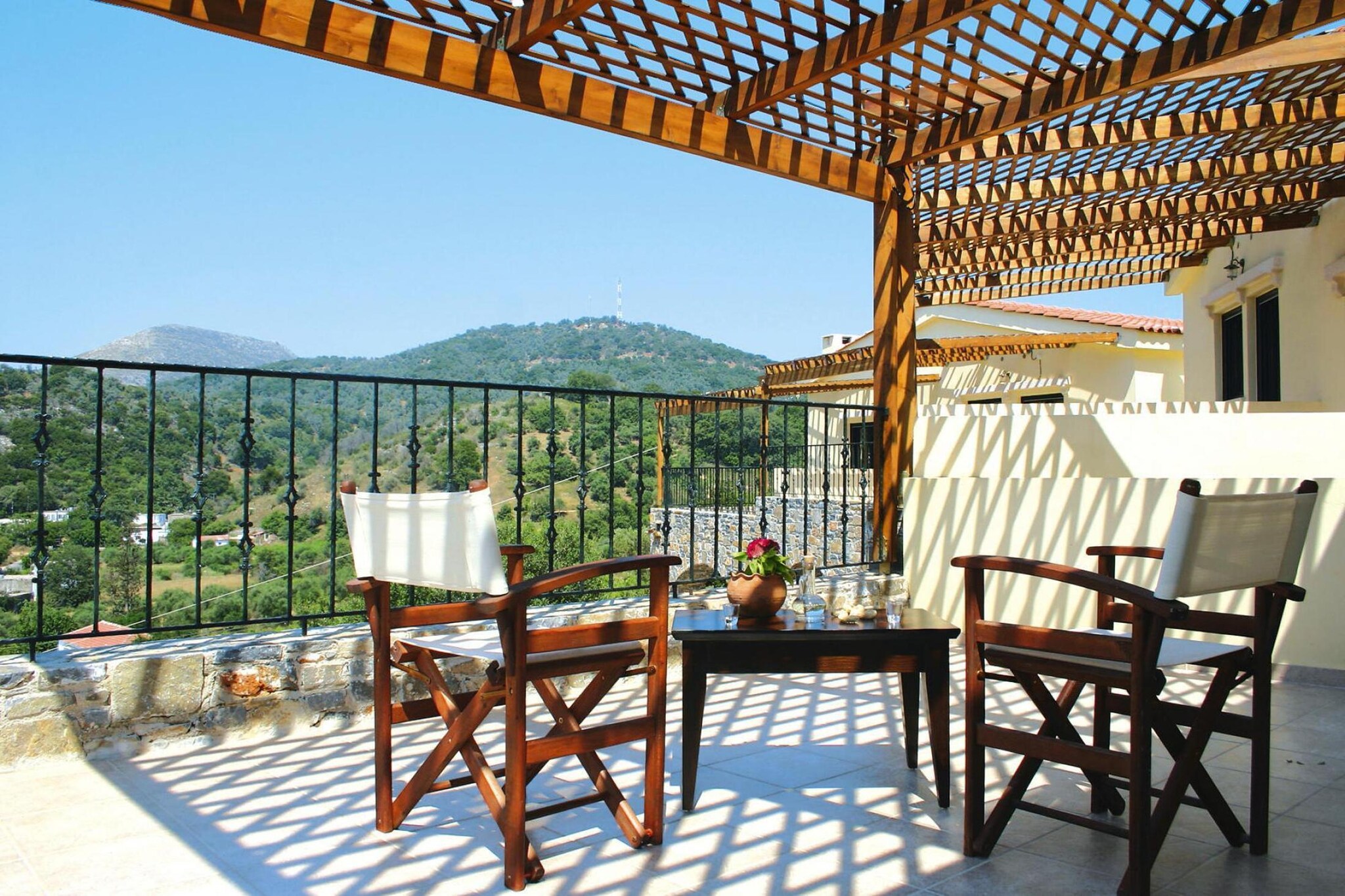 On the 1st floor: (Living room(single folding bed, single sofa bed, TV(satellite), DVD player), bedroom(double bed or 2 single beds))\n\nKitchenette(dining table, hob(2 ring stoves, electric), electric kettle, toaster, coffee machine, oven, fridge-freezer), bathroom(shower, toilet, hairdryer), veranda, sun shower, balcony, heating, terrace, garden furniture, sun loungers, parking, parasol, air conditioning(paid), swimming pool(shared with other guests), sand pit, baby crib(free)