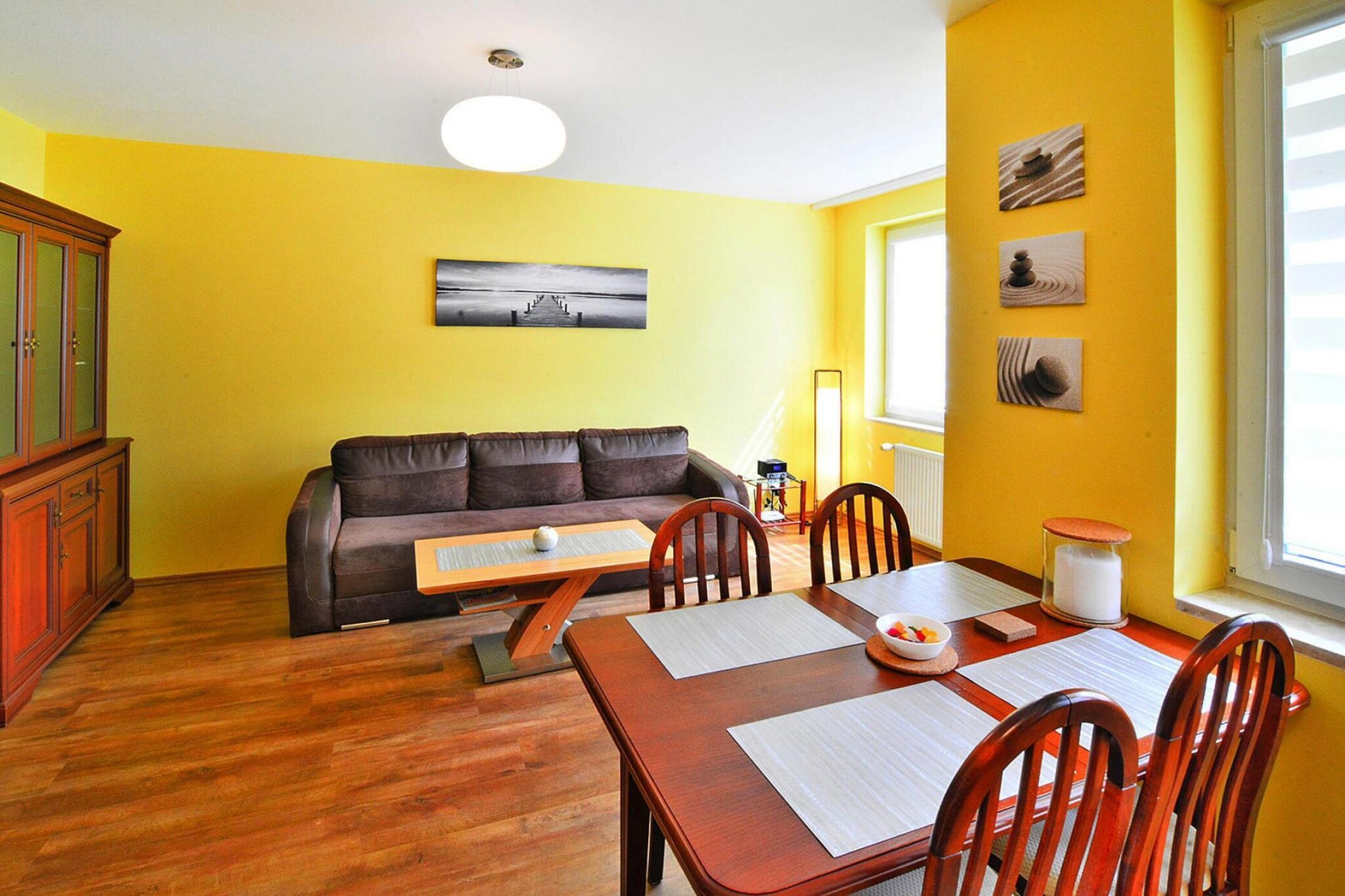 On the 1st floor: (open kitchen(hob(4 ring stoves, induction), electric kettle, toaster, coffee machine, oven, microwave, dishwasher, fridge-freezer), Living/diningroom(double sofa bed, TV(satellite, german television channels), dining table(4 persons), radio), bedroom(double bed), bathroom(shower, washbasin, toilet, washing machine), storage)\n\nInternet access, balcony, heating(central), terrace(shared with other guests), garden furniture, sun loungers, parking lot(public), fitness equipment(shared with other guests), high chair, baby crib(free)