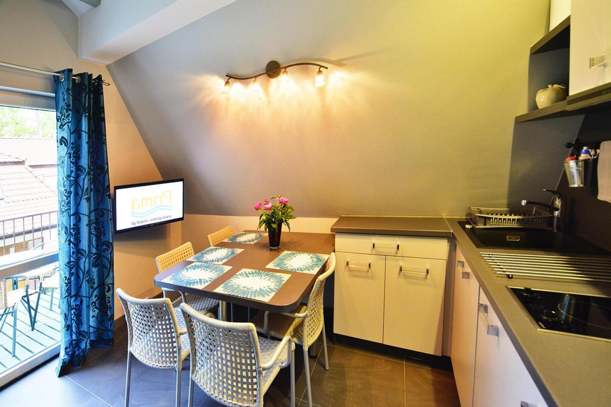 Recreation complex in Rewal, very close to the sea and the center of the resort. Only 150 m to the beach. Elegant and cozy apartments await you on the fenced property. There is a reception and parking on site.
3-room apartment on the first floor. It is designed to accommodate 5 people. It consists of 3 rooms: 2 bedrooms and a living room with a kitchenette. Bathroom with shower. The kitchenette is fully equipped (including stove, coffee maker, dishwasher, fridge with freezer). In the living room, in addition to the table and TV, there is a fold-out sofa where an additional person can sleep. Central heating. Wireless internet is available. The apartment has access to a balcony with garden furniture.
There is access to a washing machine on site (for an additional fee). There is a playground with a trampoline for the youngest guests. Recreation enthusiasts will enjoy table tennis, table football and fitness equipment.
The price of the stay includes: bed linen, electricity and water consumption, internet, parking, final cleaning.
Rewal is a holiday resort in the West Pomeranian Voivodeship. It is located on the shores of the Baltic Sea and is the center of the picturesque Rewal Coast. It offers a clean beach and a guarded swimming area. Being near the beach, you must see the symbol of the town. These are the huge Rewal Whales standing on the promenade right next to the coast and on the viewing platform.
Children will be delighted with a visit to the Whale Park, with real sea giants, and to the Fairy Tale Cottage, where they will meet face to face with fairy-tale characters. In bad weather, an ideal option will be a trip to one of several public indoor swimming pools. The Gibon Rope Park will also be fantastic entertainment for the whole family or a group of friends, offering a lot of obstacles to overcome suspended high in the treetops. Of course, with appropriate protection.