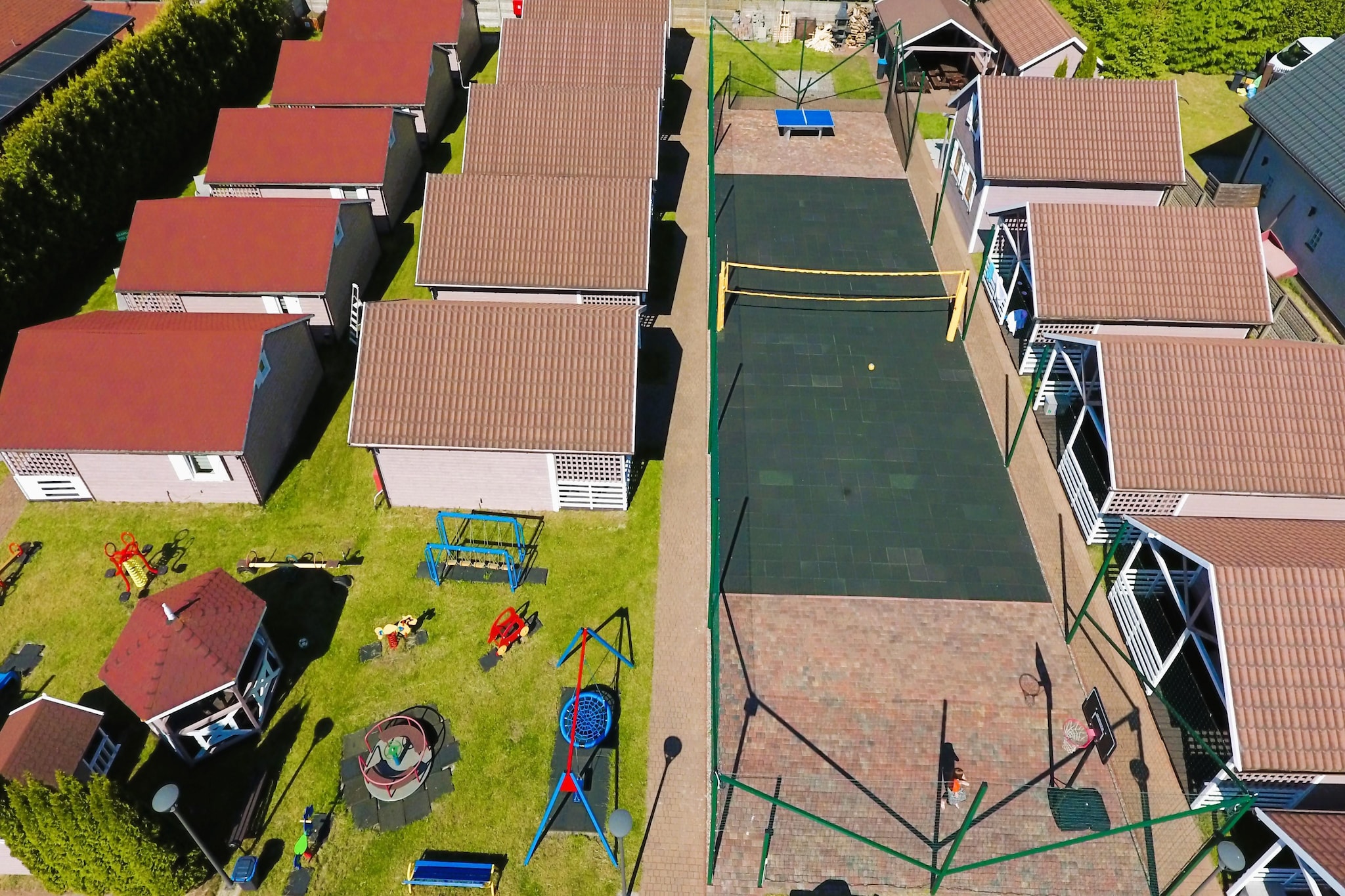 Domy wakacyjne w Międzyzdrojach z podgrzewanym basenem-Exterior in summer