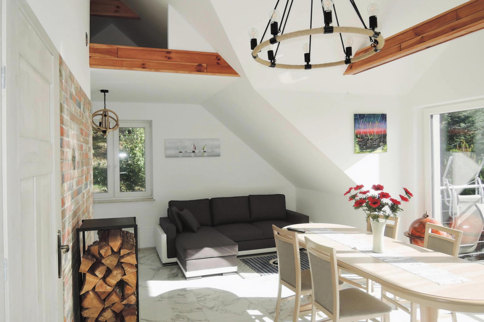 The newly built holiday home is located in the middle of the Wolin National Park, in an idyllic and direct location on the Szczecin lagoon. Bright and modern furnished and from the balcony you have a beautiful view of the lagoon of Szczecin. If you wish, you can rent two canoes on site and take a water excursion on the Szczecin Lagoon. The village of Karnocicie is located about 5 km west of Wollin, 23 km southwest of Kamie? Pomorski and 49 km north of the Capital Szczecin The rural town impresses with its direct location right on the Szczecin Lagoon, surrounded by the natural Wolin National Park with well-developed hiking and cycling trails.



Details: Consumption-based energy costs, bed linen, towels, final cleaning Tourist tax



Activities nearby: The Szczecin Lagoon offers many possibilities to spend your holidays, for example you can rent kayaks, sailboats, rowboats and pedal boats directly at the property and spend the day on the water. You can also drive to the well-known town of Miedzyzdroje, about 15 minutes by car, and to the second largest town, Wollin, where you can find a variety of shops. If you are looking for more than just a beach holiday, you will find it on the island of Wollin. Nearby attractions include the port town of Wollin, the former meeting point for traders from all over the world with its Wkinger fortress, the Kreideberg at Miedzyzdroje with fantastic views over the Baltic Sea, the western picnic land in Sulomino (in July), and the Bunker Museum Zalesie. Also a trip to the turquoise shiny quarry pond Jezioro Turkusowe in Wapnica, the viewpoint "green hill" with a view over the pig delta and the natural stone lighthouse "Latarnia Kikut" in Wiselka.



Not suitable for people with reduced mobility