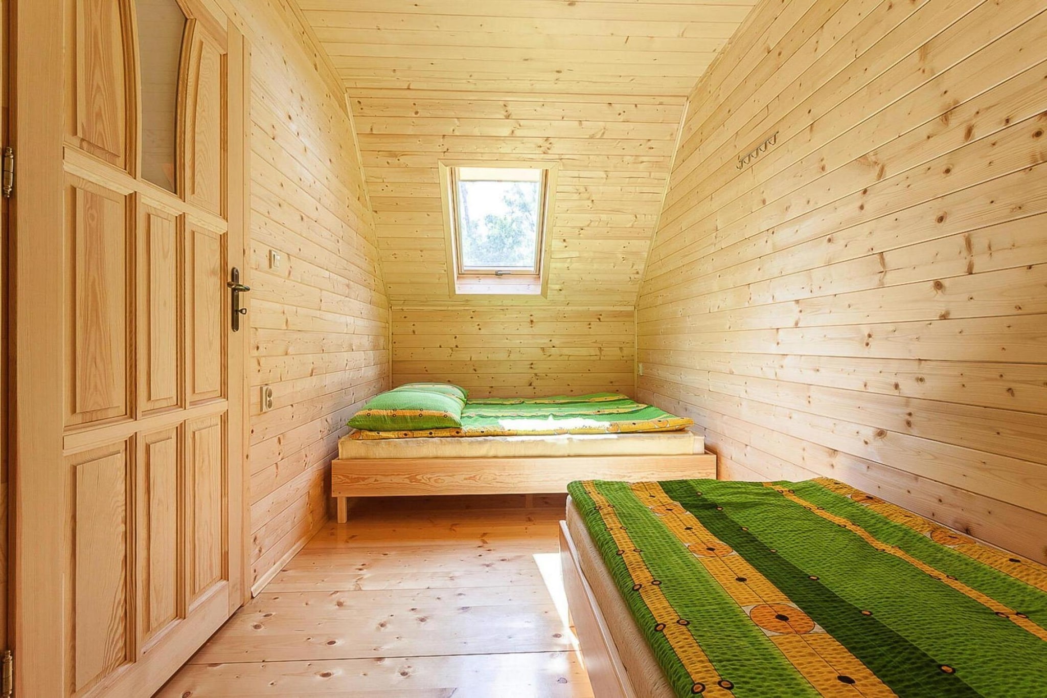 Ground floor: (Kitchenette(electric kettle, boiling water tap, toaster, cooker, espresso machine, fridge-freezer), Living/bed room(double sofa bed, TV(satellite, german television channels), dining table, seating area), bathroom(shower, washbasin, toilet))\n\nOn the 1st floor: (bedroom(single bed, double bed), bedroom(single bed, single bed, double bed))\n\ngrill, balcony, garden furniture, sun loungers, parking, high chair, Garden shed, baby crib(paid)