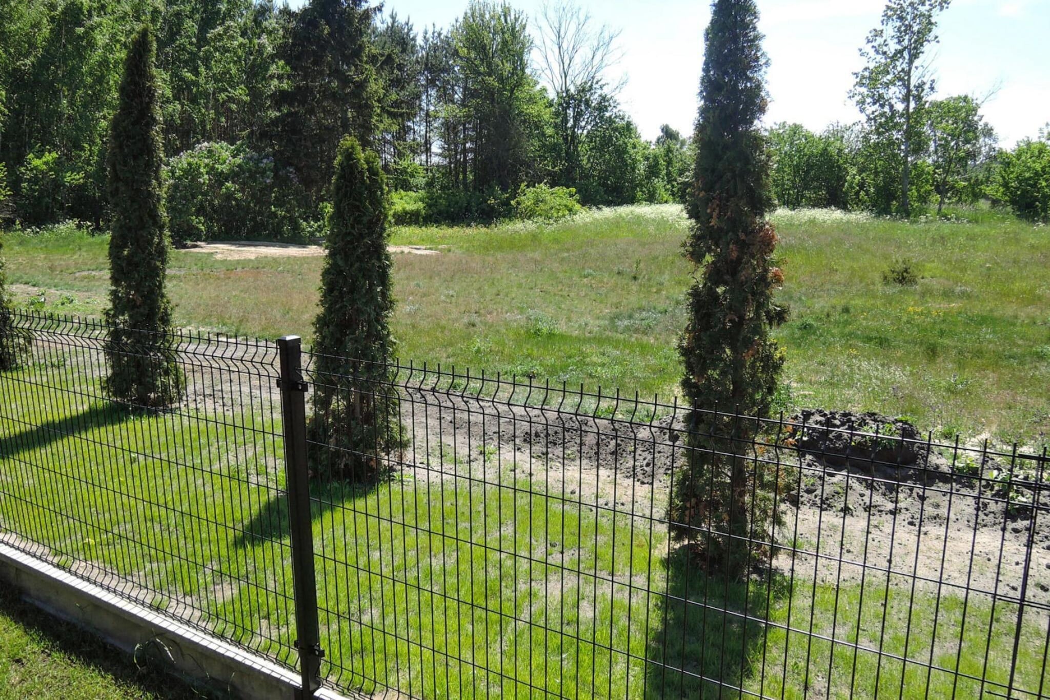 HolidayHouse with the big tarasse&garden in Kolczewo LIT-Garten Sommer