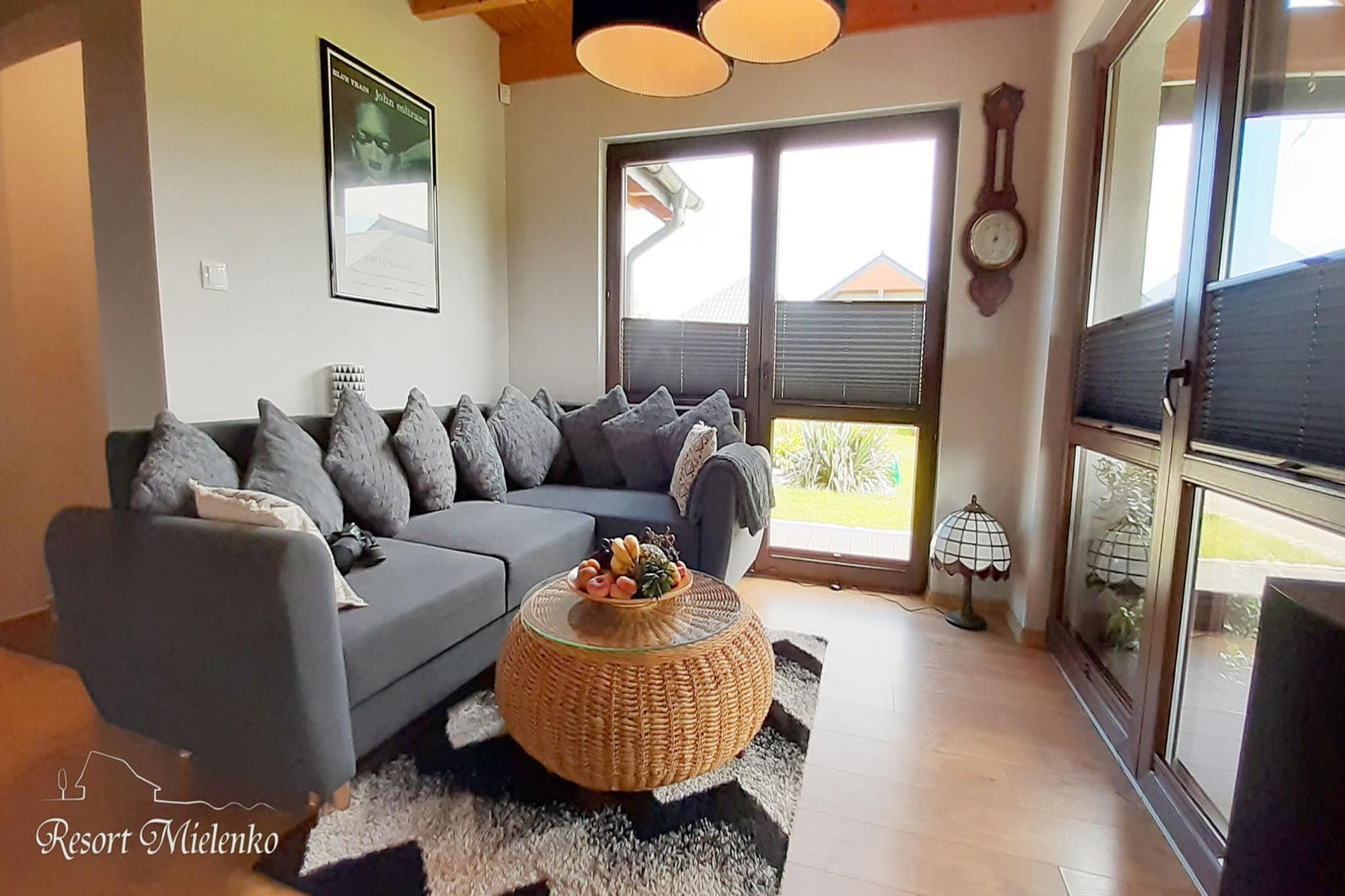 A family holiday resort on the edge of Mielno - a small, quiet seaside settlement, which is a quiet suburb of the more bustling resort of Mielno. The beach is 850 m away. The quiet centre of Mielno is within a few steps. In Mielno, 3 km away, there are many restaurants, cafes and shops.

A very comfortable holiday home is located in the middle of a fenced, well-kept area belonging to an intimate holiday resort. The house has two storeys and has a covered terrace, where a set of comfortable lounge furniture awaits. On the ground floor there is a spacious living room with a large table and TV. There is also a fold-out, 2-person sofa. The living room is connected to a perfectly equipped kitchen. On the ground floor there is also a bedroom with a double bed and a bathroom with a shower (there is also a washing machine). On the first floor there are 3 more bedrooms and a second bathroom with a shower. The house is equipped with efficient heating. Wireless internet is available.
The resort offers many attractions for guests who come here. There is a year-round sauna and outdoor jacuzzi (included in the price of the stay, available to all guests of the resort). There is also a bicycle rental (including electric ones). There is a public barbecue gazebo in the garden. An attractive playground has been prepared for the youngest guests on the premises of the resort.
It is also possible to order breakfasts and lunches on site.
The price of the stay includes: bed linen, towels, electricity and water consumption, sauna, whirlpool bath, final cleaning, internet, parking, tourist tax. On request, after prior arrangement, it is possible to rent a cot for a small child and a high chair (free of charge).
The beautiful seaside beach can be quickly reached on foot or by bike. 3 km from the resort there is Lake Jamno with a marina, water equipment rental (pedal bikes, kayaks, rowing boats). There are also fishing spots here.