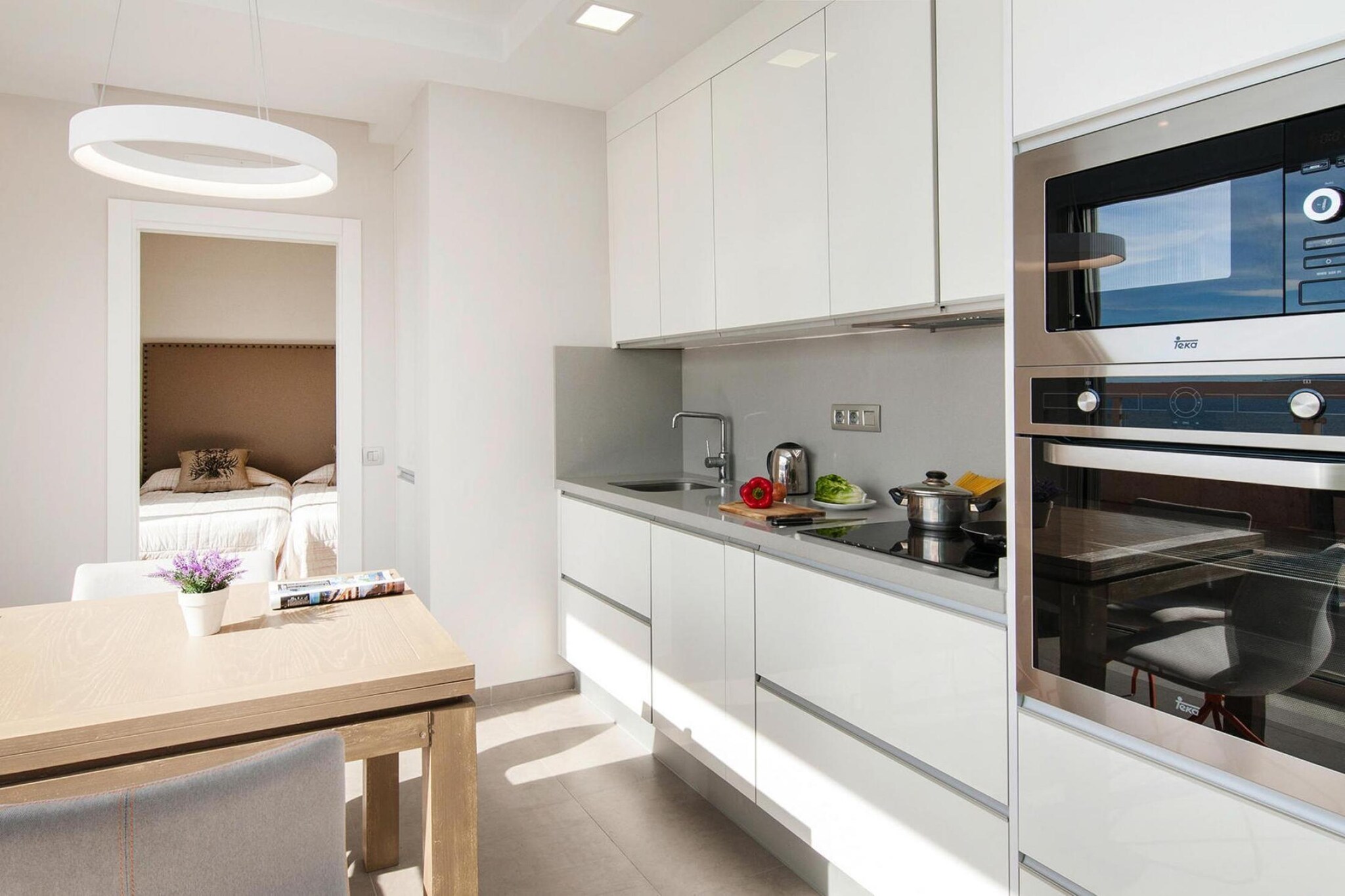 open kitchen(hob(3 ring stoves, ceramic), electric kettle, toaster, coffee machine, oven, microwave, dishwasher, fridge-freezer), Living/diningroom(TV(satellite, german television channels), DVD player), bedroom(2x single bed), bathroom(shower, toilet, hairdryer), washing machine, balcony, garden furniture, sun loungers, lift, high chair, awning, baby crib(free)