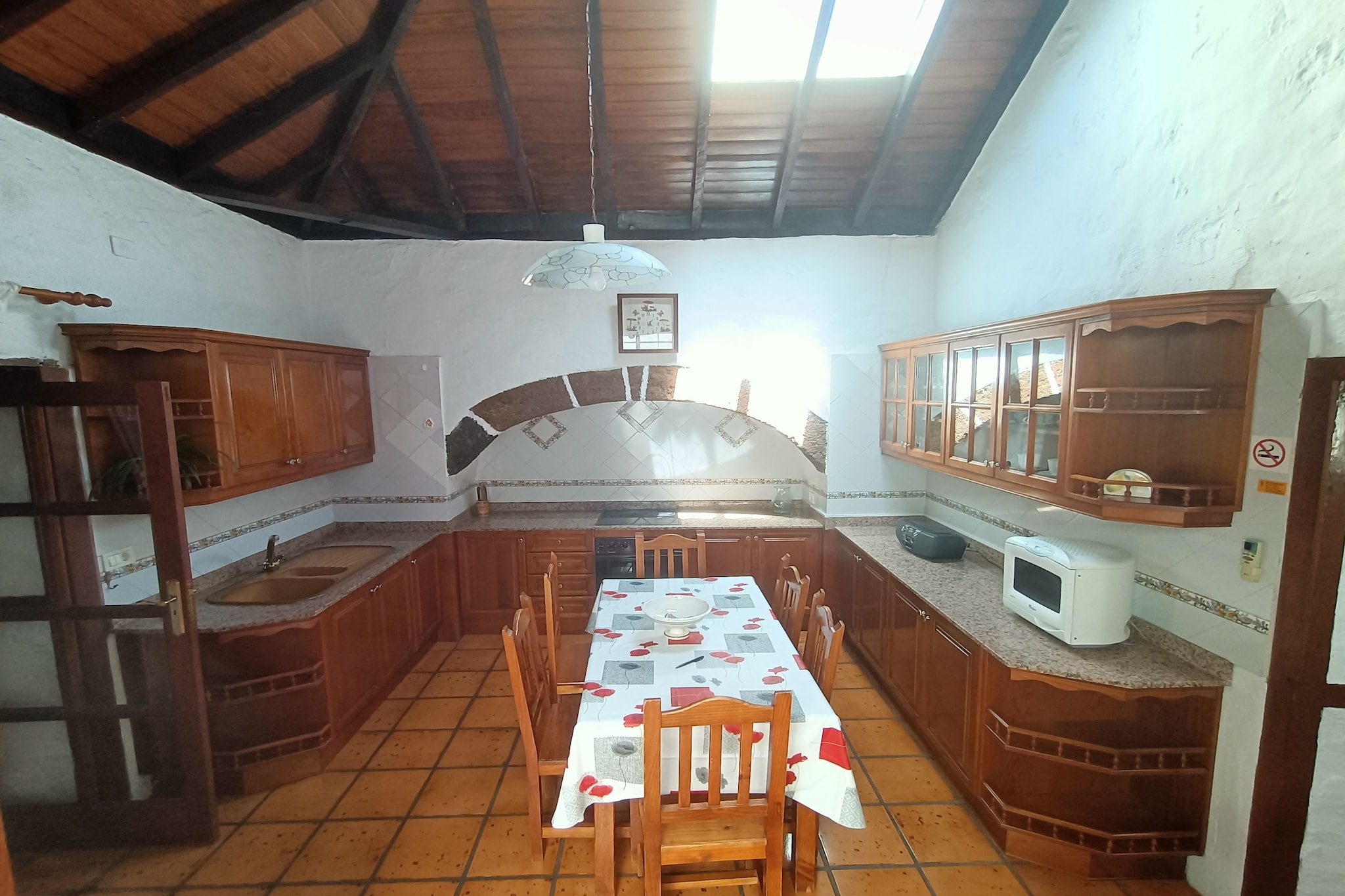 Living room(2x single bed, TV(satellite, german television channels)), Kitchen(dining table, stove, electric kettle, toaster, coffee machine, oven, microwave, fridge-freezer), bedroom(double bed), bedroom(accessible via interconnecting room)(2x single bed), bathroom(bath tub, shower, toilet), radio, CD player, grill, fridge, air conditioning, terrace, garden furniture, parking, baby crib(free)