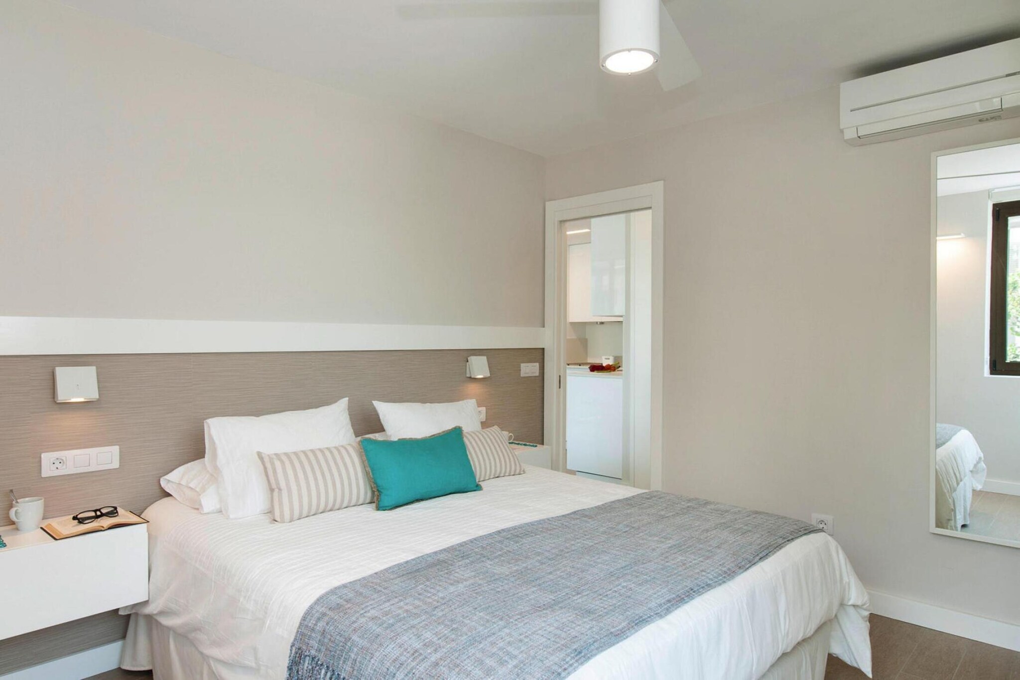 On the 2nd floor: (open kitchen(stove, electric kettle, toaster, coffee machine, oven, microwave, dishwasher, fridge-freezer), Living/diningroom(single sofa bed, TV(satellite, german television channels)), bedroom(double bed), bathroom(shower, toilet, hairdryer), tumble dryer, washing machine, air conditioning, terrace(roofed), high chair, baby crib(free))