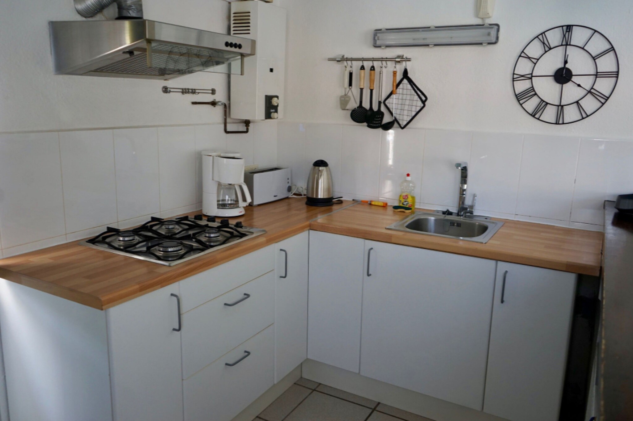 Ground floor: (Living room(TV, seating area, heating, air conditioning), Kitchen(coffee machine, oven, microwave, fridge-freezer), bedroom(double bed), bedroom(bunk bed), bathroom(shower, washbasin, toilet))\n\nBBQ, swimming pool(private, shared with the owner )