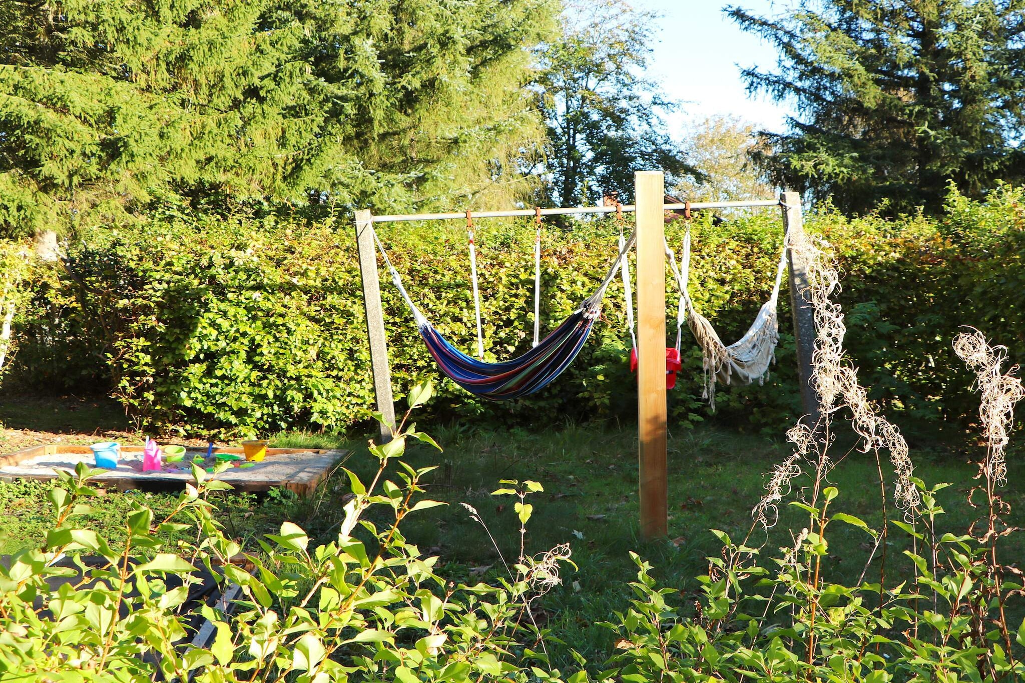 This large and well-appointed cottage is the former village school in Staby. The holiday home, which is designed for 20 people, is located calmly and peacefully with a view of fields to one side - and to the other offers a courtyard and a large natural plot, surrounded by beech hedges. Life is enjoyed in a closed and flourishing oasis. The organization of the house provides an opportunity for community, but also for people to retire. The building is certified worthy of preservation and a true gem for a multi-generational holiday, a writing stay or a good change from a busy everyday life. The 250 m2 ground floor is divided into a contiguous eastern and western section. Seven of the rooms are over 20 m2. The heart of the house is the large fireplace room, which is also furnished with the house's common dining room and a well-equipped kitchen with two ovens m.m. In the adjoining TV room there is also a well-tuned Hornung and Møller grand piano. In addition, & # 8217; East & # 8217; of three bright rooms & # 8211; all equipped with double beds. In addition, there are two smaller bathrooms with underfloor heating. & # 8217; Vest & # 8217; is a separate apartment with three bedrooms with double beds and two living rooms - equipped with large work table, wood stove and panoramic window to the west with a wonderful afternoon and evening light. In this department there are two large bathrooms. From both east and west there is access to the house's large southern lawn surrounded by powerful beech trees. On the first floor to the south / west, another independent apartment offers itself with a bright and cosily furnished living room with day-bed and dining table. There is open access to a smaller kitchen, and in connection with the living room there is the possibility of two extra beds in alcove-like interiors. In addition, there are three large rooms - with new double beds and desks. There is also access to the bathroom incl. shower on the first floor. The tranquility spreads accompanied by the view and the many incidents of light. Utility room with washer and dryer. The cottage is i.a. also equipped with free, wireless

A refundable deposit might be charged closer to your check-in date. This deposit covers utilities consumed during your stay and any additional services that may be taken. The final amount will be adjusted based on actual meter readings, actual usage of extra services, and any remaining balance will be refunded within 21 days after checkout.